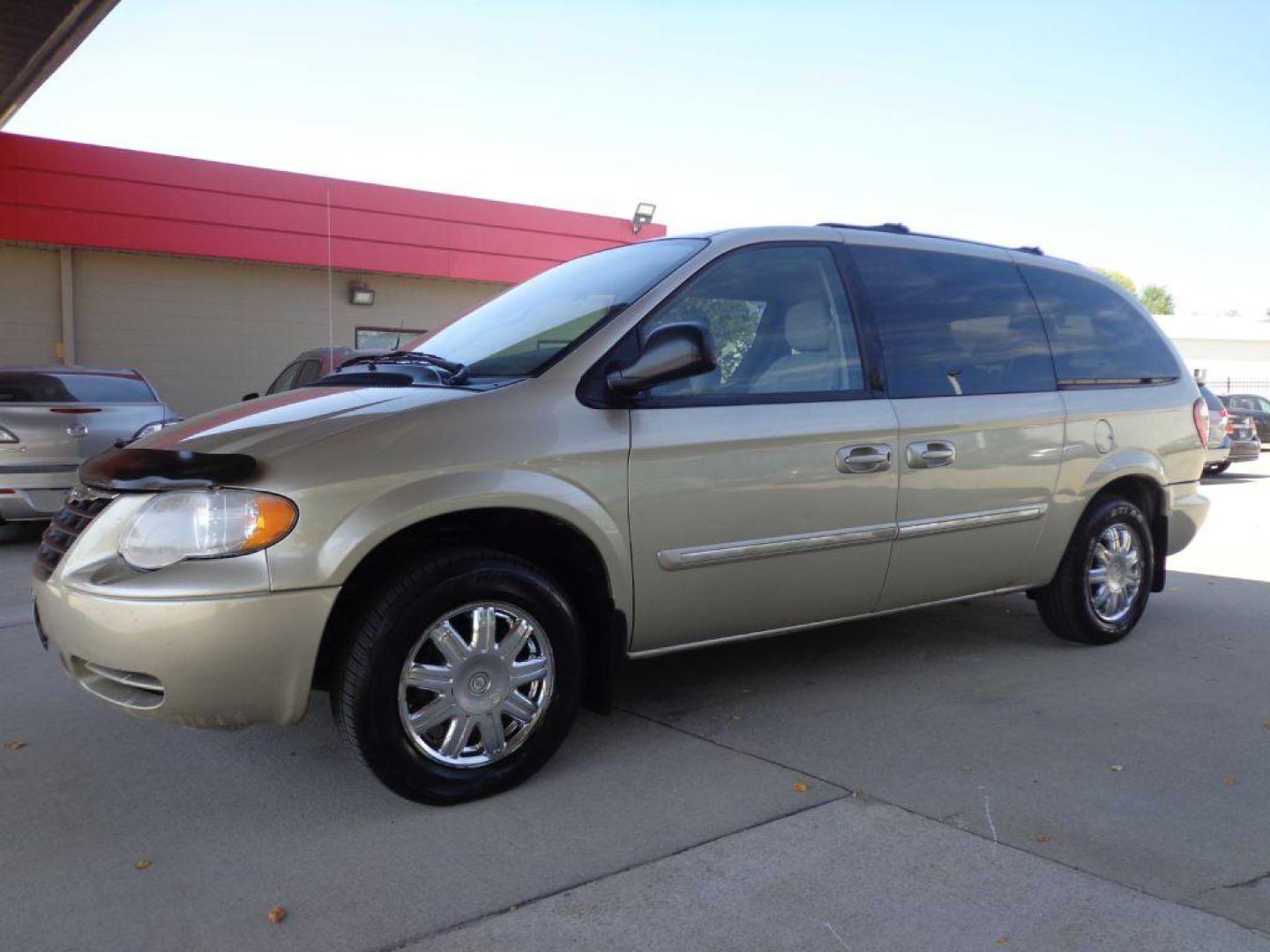 2007 TAN CHRYSLER TOWN and COUNTRY TOURING (2A4GP54LX7R) with an 3.8L engine, Automatic transmission, located at 6610 L St., Omaha, NE, 68117, (402) 731-7800, 41.212872, -96.014702 - FRESH TRADE, LOW MILEAGE, PRE-INSPECTED, HEATED LEATHER, POWER DOORS, COLD A/C AND NEWER TIRES! THERE IS SURFACE RUST PRESENT! *****We have found that most customers do the majority of their shopping online before visiting a dealership. For this reason we feel it necessary to have a competitive - Photo#0