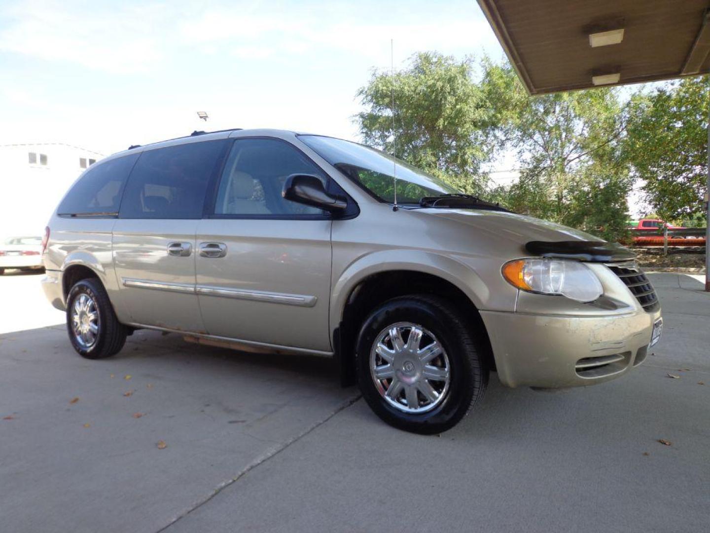 2007 TAN CHRYSLER TOWN and COUNTRY TOURING (2A4GP54LX7R) with an 3.8L engine, Automatic transmission, located at 6610 L St., Omaha, NE, 68117, (402) 731-7800, 41.212872, -96.014702 - FRESH TRADE, LOW MILEAGE, PRE-INSPECTED, HEATED LEATHER, POWER DOORS, COLD A/C AND NEWER TIRES! THERE IS SURFACE RUST PRESENT! *****We have found that most customers do the majority of their shopping online before visiting a dealership. For this reason we feel it necessary to have a competitive - Photo#2