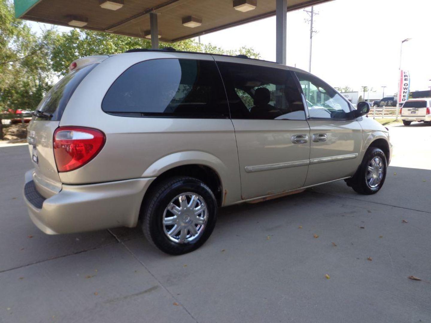 2007 TAN CHRYSLER TOWN and COUNTRY TOURING (2A4GP54LX7R) with an 3.8L engine, Automatic transmission, located at 6610 L St., Omaha, NE, 68117, (402) 731-7800, 41.212872, -96.014702 - FRESH TRADE, LOW MILEAGE, PRE-INSPECTED, HEATED LEATHER, POWER DOORS, COLD A/C AND NEWER TIRES! THERE IS SURFACE RUST PRESENT! *****We have found that most customers do the majority of their shopping online before visiting a dealership. For this reason we feel it necessary to have a competitive - Photo#3