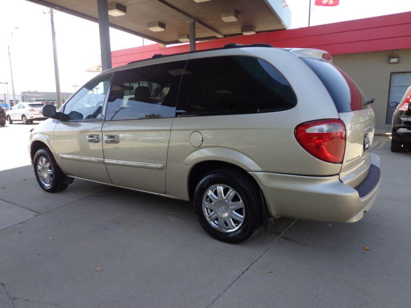 2007 TAN CHRYSLER TOWN and COUNTRY TOURING (2A4GP54LX7R) with an 3.8L engine, Automatic transmission, located at 6610 L St., Omaha, NE, 68117, (402) 731-7800, 41.212872, -96.014702 - FRESH TRADE, LOW MILEAGE, PRE-INSPECTED, HEATED LEATHER, POWER DOORS, COLD A/C AND NEWER TIRES! THERE IS SURFACE RUST PRESENT! *****We have found that most customers do the majority of their shopping online before visiting a dealership. For this reason we feel it necessary to have a competitive - Photo#5