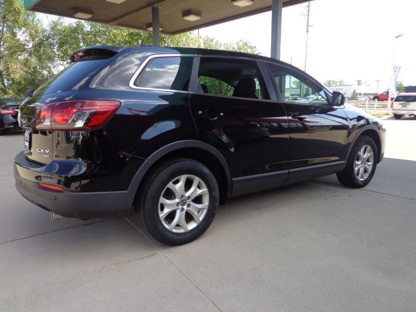 2013 BLACK MAZDA CX-9 TOURING (JM3TB3CVXD0) with an 3.7L engine, Automatic transmission, located at 6610 L St., Omaha, NE, 68117, (402) 731-7800, 41.212872, -96.014702 - 1-OWNER CLEAN CARFAX LOW MILEAGE LOADED WITH NAV, BACKUP CAM, SUNROOF, 3RD ROW, HEATED LEATHER, BOSE AUDIO, BSM AND NEWER TIRES! *****We have found that most customers do the majority of their shopping online before visiting a dealership. For this reason we feel it necessary to have a competi - Photo#3