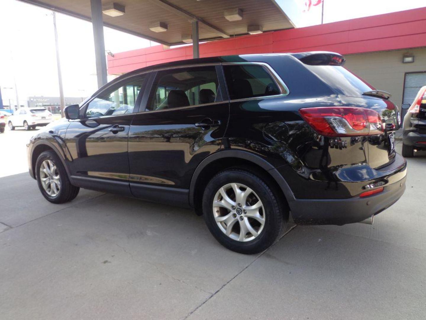 2013 BLACK MAZDA CX-9 TOURING (JM3TB3CVXD0) with an 3.7L engine, Automatic transmission, located at 6610 L St., Omaha, NE, 68117, (402) 731-7800, 41.212872, -96.014702 - 1-OWNER CLEAN CARFAX LOW MILEAGE LOADED WITH NAV, BACKUP CAM, SUNROOF, 3RD ROW, HEATED LEATHER, BOSE AUDIO, BSM AND NEWER TIRES! *****We have found that most customers do the majority of their shopping online before visiting a dealership. For this reason we feel it necessary to have a competi - Photo#5