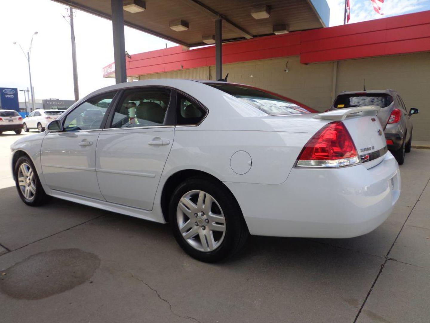 2011 WHITE CHEVROLET IMPALA LT (2G1WG5EK7B1) with an 3.5L engine, Automatic transmission, located at 6610 L St., Omaha, NE, 68117, (402) 731-7800, 41.212872, -96.014702 - SHARP LOW MILE IMPALA WITHHEATED LEATHER, SUNROOF, BOSE AUDIO AND NEWER TIRES! *****We have found that most customers do the majority of their shopping online before visiting a dealership. For this reason we feel it necessary to have a competitive price on our used vehicles right up front. We - Photo#5