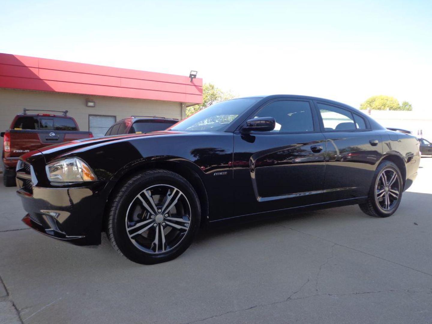 2014 BLACK DODGE CHARGER R/T (2C3CDXDT7EH) with an 5.7L engine, Automatic transmission, located at 6610 L St., Omaha, NE, 68117, (402) 731-7800, 41.212872, -96.014702 - 2-OWNER , CLEAN CARFAX, LOW MILEAGE, AWD, HEATED SEATS, BEATS AUDIO AND NEWER TIRES! *****We have found that most customers do the majority of their shopping online before visiting a dealership. For this reason we feel it necessary to have a competitive price on our used vehicles right up front - Photo#0