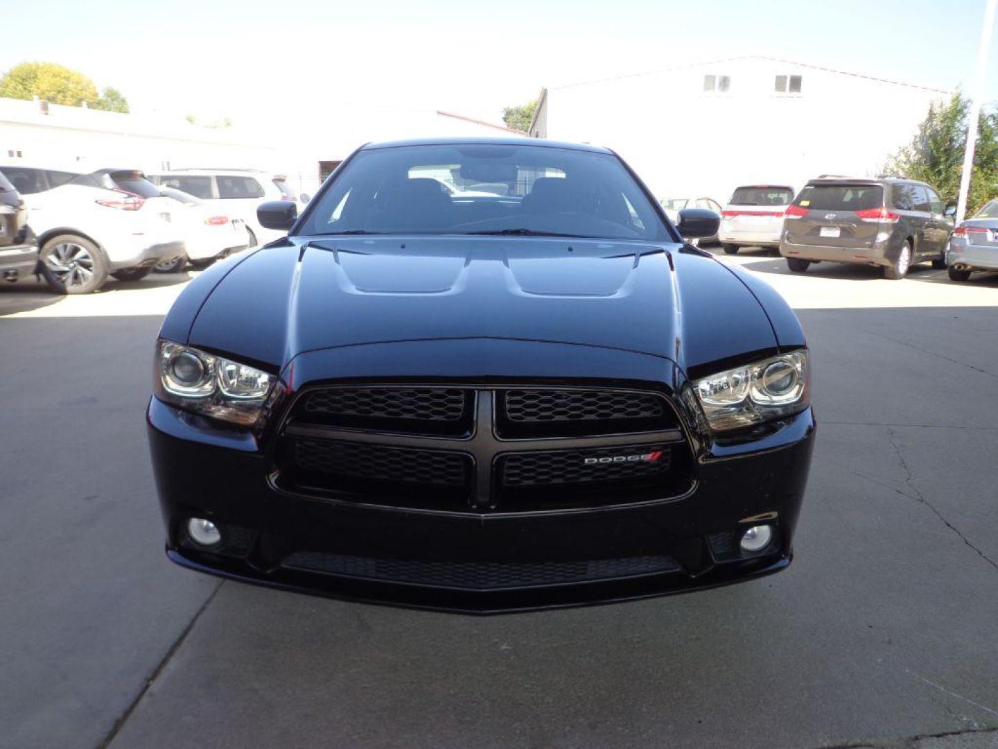 2014 BLACK DODGE CHARGER R/T (2C3CDXDT7EH) with an 5.7L engine, Automatic transmission, located at 6610 L St., Omaha, NE, 68117, (402) 731-7800, 41.212872, -96.014702 - 2-OWNER , CLEAN CARFAX, LOW MILEAGE, AWD, HEATED SEATS, BEATS AUDIO AND NEWER TIRES! *****We have found that most customers do the majority of their shopping online before visiting a dealership. For this reason we feel it necessary to have a competitive price on our used vehicles right up front - Photo#1