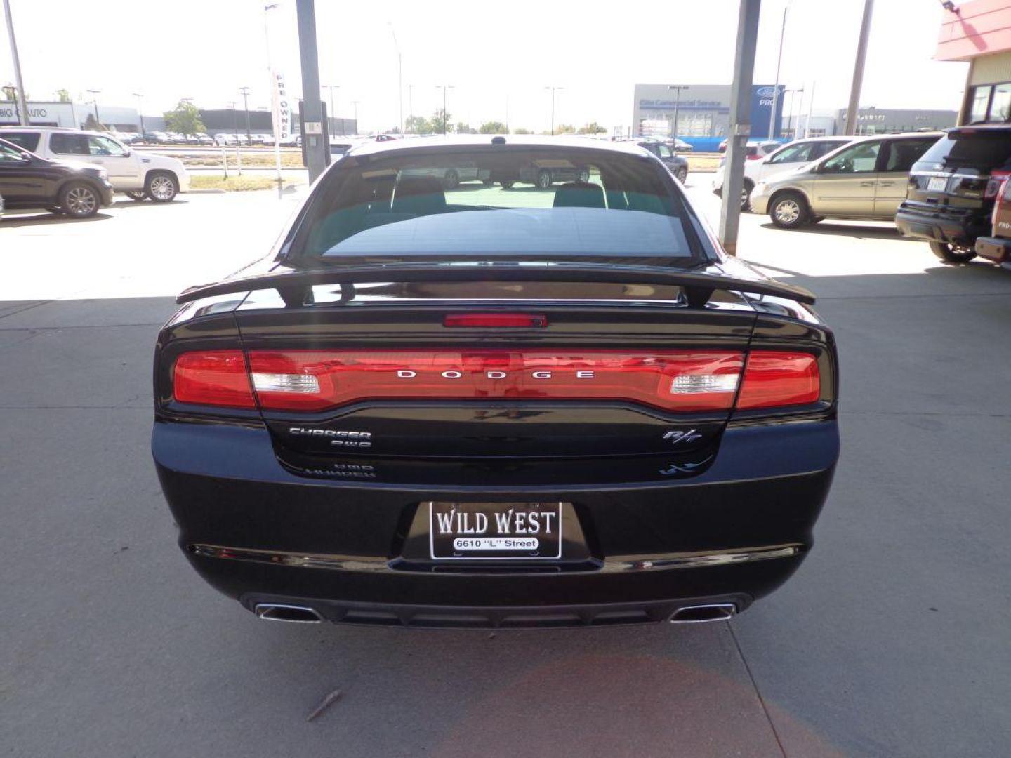 2014 BLACK DODGE CHARGER R/T (2C3CDXDT7EH) with an 5.7L engine, Automatic transmission, located at 6610 L St., Omaha, NE, 68117, (402) 731-7800, 41.212872, -96.014702 - 2-OWNER , CLEAN CARFAX, LOW MILEAGE, AWD, HEATED SEATS, BEATS AUDIO AND NEWER TIRES! *****We have found that most customers do the majority of their shopping online before visiting a dealership. For this reason we feel it necessary to have a competitive price on our used vehicles right up front - Photo#4