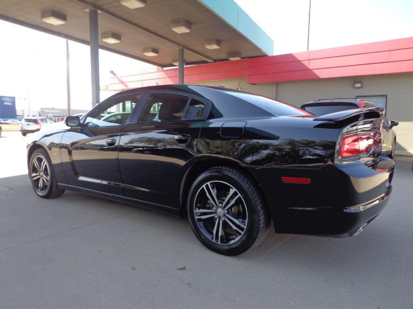 2014 BLACK DODGE CHARGER R/T (2C3CDXDT7EH) with an 5.7L engine, Automatic transmission, located at 6610 L St., Omaha, NE, 68117, (402) 731-7800, 41.212872, -96.014702 - 2-OWNER , CLEAN CARFAX, LOW MILEAGE, AWD, HEATED SEATS, BEATS AUDIO AND NEWER TIRES! *****We have found that most customers do the majority of their shopping online before visiting a dealership. For this reason we feel it necessary to have a competitive price on our used vehicles right up front - Photo#5