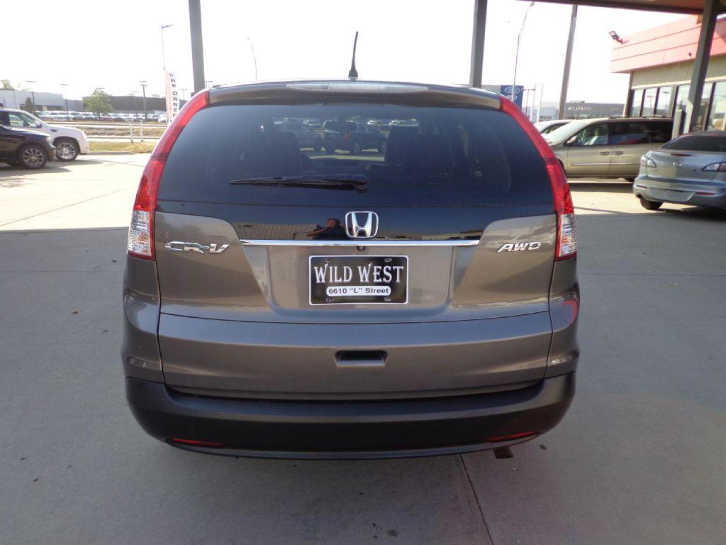 2014 BROWN HONDA CR-V EX (5J6RM4H50EL) with an 2.4L engine, Automatic transmission, located at 6610 L St., Omaha, NE, 68117, (402) 731-7800, 41.212872, -96.014702 - LOCAL TRADE-IN, RUNS AND DRIVES GREAT WITH A SUNROOF, BACKUP CAM AND NEWER TIRES! *****We have found that most customers do the majority of their shopping online before visiting a dealership. For this reason we feel it necessary to have a competitive price on our used vehicles right up front. - Photo#4