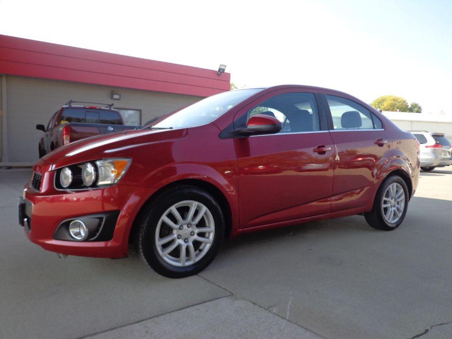 2013 RED CHEVROLET SONIC LT (1G1JC5SH2D4) with an 1.8L engine, Automatic transmission, located at 6610 L St., Omaha, NE, 68117, (402) 731-7800, 41.212872, -96.014702 - 1-OWNER, CLEAN CARFAX , LOW MILEAGE WITH NEWER TIRES! *****We have found that most customers do the majority of their shopping online before visiting a dealership. For this reason we feel it necessary to have a competitive price on our used vehicles right up front. We spend time researching the - Photo#0