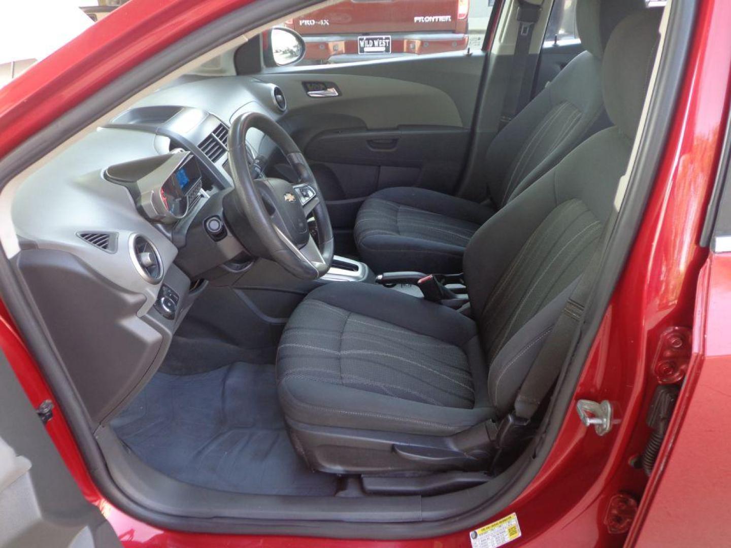 2013 RED CHEVROLET SONIC LT (1G1JC5SH2D4) with an 1.8L engine, Automatic transmission, located at 6610 L St., Omaha, NE, 68117, (402) 731-7800, 41.212872, -96.014702 - 1-OWNER, CLEAN CARFAX , LOW MILEAGE WITH NEWER TIRES! *****We have found that most customers do the majority of their shopping online before visiting a dealership. For this reason we feel it necessary to have a competitive price on our used vehicles right up front. We spend time researching the - Photo#12