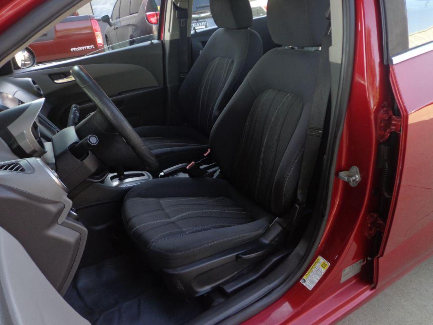 2013 RED CHEVROLET SONIC LT (1G1JC5SH2D4) with an 1.8L engine, Automatic transmission, located at 6610 L St., Omaha, NE, 68117, (402) 731-7800, 41.212872, -96.014702 - 1-OWNER, CLEAN CARFAX , LOW MILEAGE WITH NEWER TIRES! *****We have found that most customers do the majority of their shopping online before visiting a dealership. For this reason we feel it necessary to have a competitive price on our used vehicles right up front. We spend time researching the - Photo#13