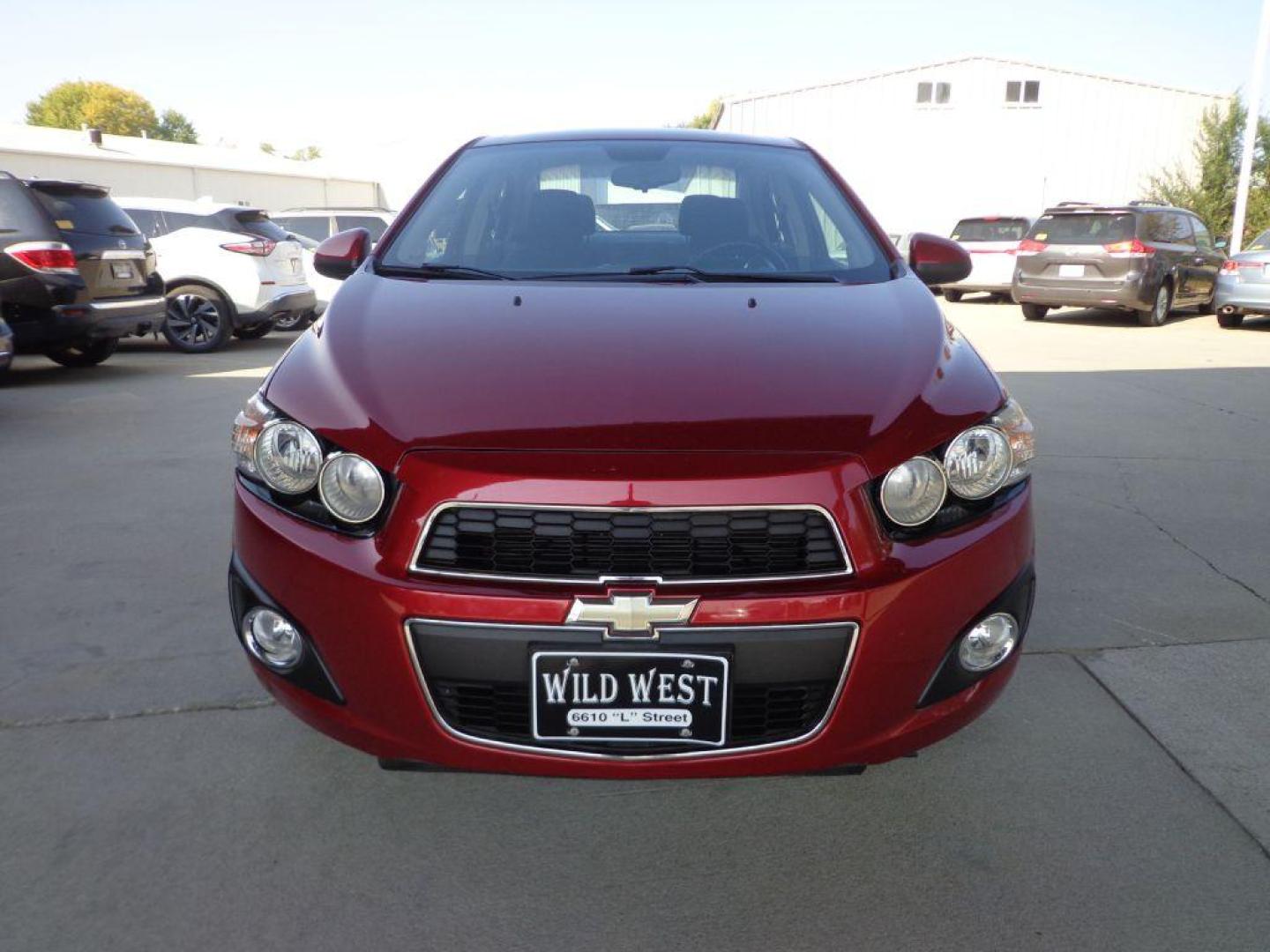 2013 RED CHEVROLET SONIC LT (1G1JC5SH2D4) with an 1.8L engine, Automatic transmission, located at 6610 L St., Omaha, NE, 68117, (402) 731-7800, 41.212872, -96.014702 - 1-OWNER, CLEAN CARFAX , LOW MILEAGE WITH NEWER TIRES! *****We have found that most customers do the majority of their shopping online before visiting a dealership. For this reason we feel it necessary to have a competitive price on our used vehicles right up front. We spend time researching the - Photo#1