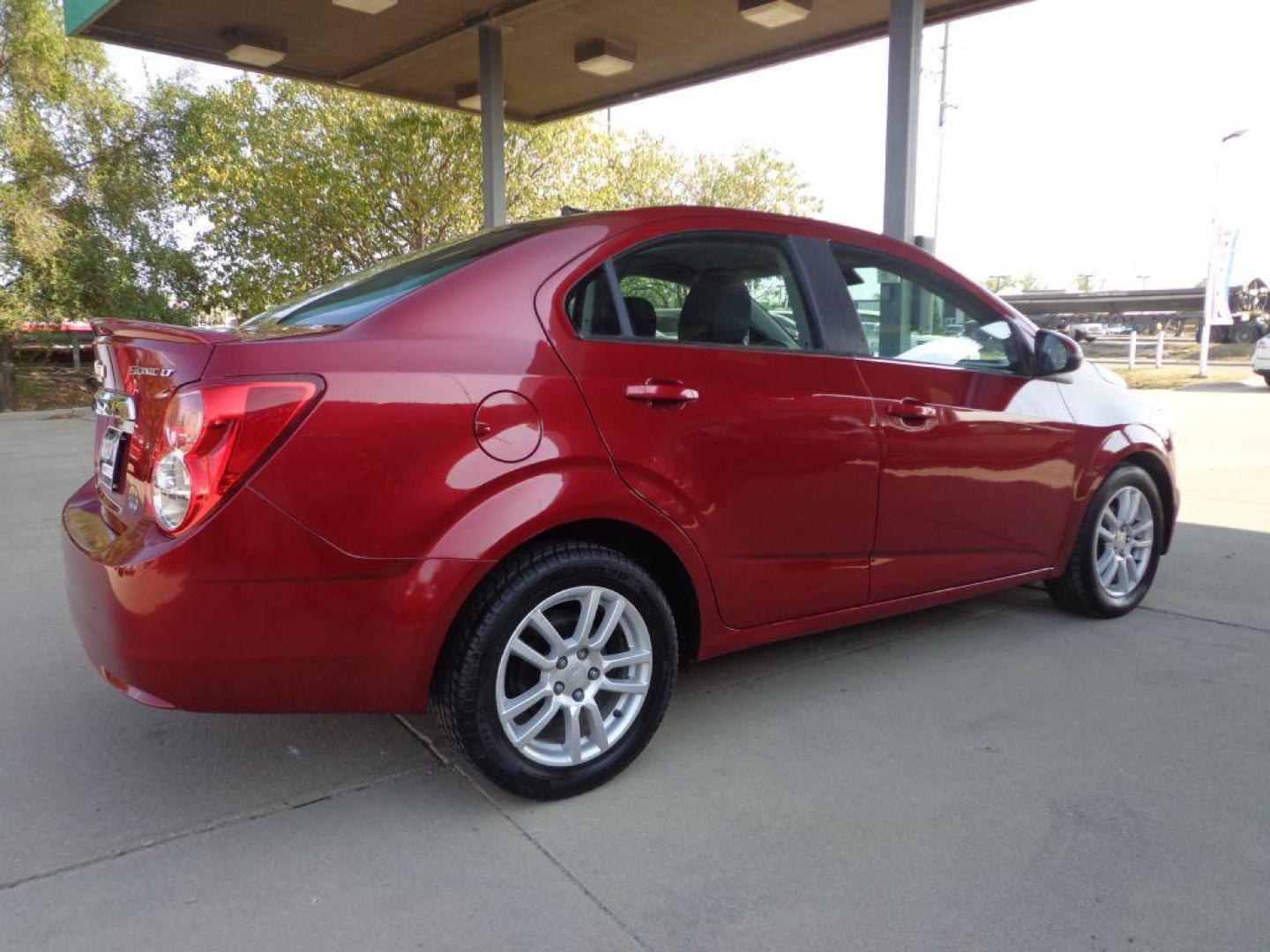 2013 RED CHEVROLET SONIC LT (1G1JC5SH2D4) with an 1.8L engine, Automatic transmission, located at 6610 L St., Omaha, NE, 68117, (402) 731-7800, 41.212872, -96.014702 - 1-OWNER, CLEAN CARFAX , LOW MILEAGE WITH NEWER TIRES! *****We have found that most customers do the majority of their shopping online before visiting a dealership. For this reason we feel it necessary to have a competitive price on our used vehicles right up front. We spend time researching the - Photo#3