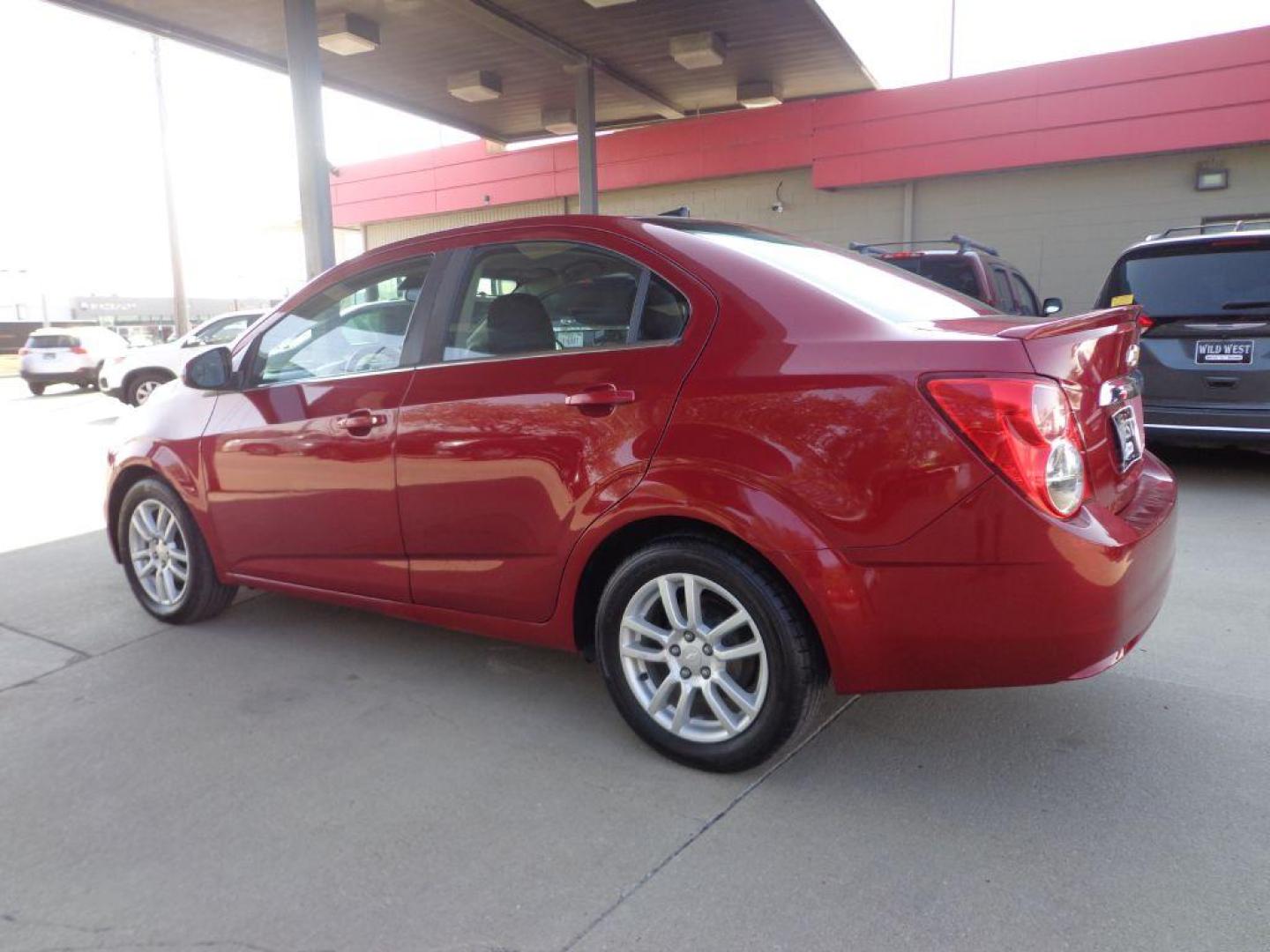 2013 RED CHEVROLET SONIC LT (1G1JC5SH2D4) with an 1.8L engine, Automatic transmission, located at 6610 L St., Omaha, NE, 68117, (402) 731-7800, 41.212872, -96.014702 - 1-OWNER, CLEAN CARFAX , LOW MILEAGE WITH NEWER TIRES! *****We have found that most customers do the majority of their shopping online before visiting a dealership. For this reason we feel it necessary to have a competitive price on our used vehicles right up front. We spend time researching the - Photo#5