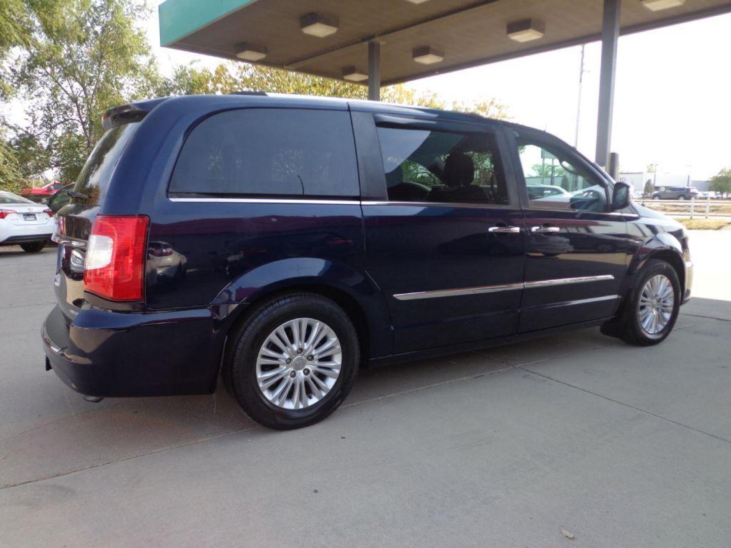 2012 BLUE CHRYSLER TOWN and COUNTRY LIMITED (2C4RC1GG2CR) with an 3.6L engine, Automatic transmission, located at 6610 L St., Omaha, NE, 68117, (402) 731-7800, 41.212872, -96.014702 - 2-OWNER, CLEAN CARFAX, LOW MILEAGE, LOADED WITH REAR ENTERTAINMENT, NAV, BACKUP CAM AND NEWER TIRES! *****We have found that most customers do the majority of their shopping online before visiting a dealership. For this reason we feel it necessary to have a competitive price on our used vehic - Photo#3