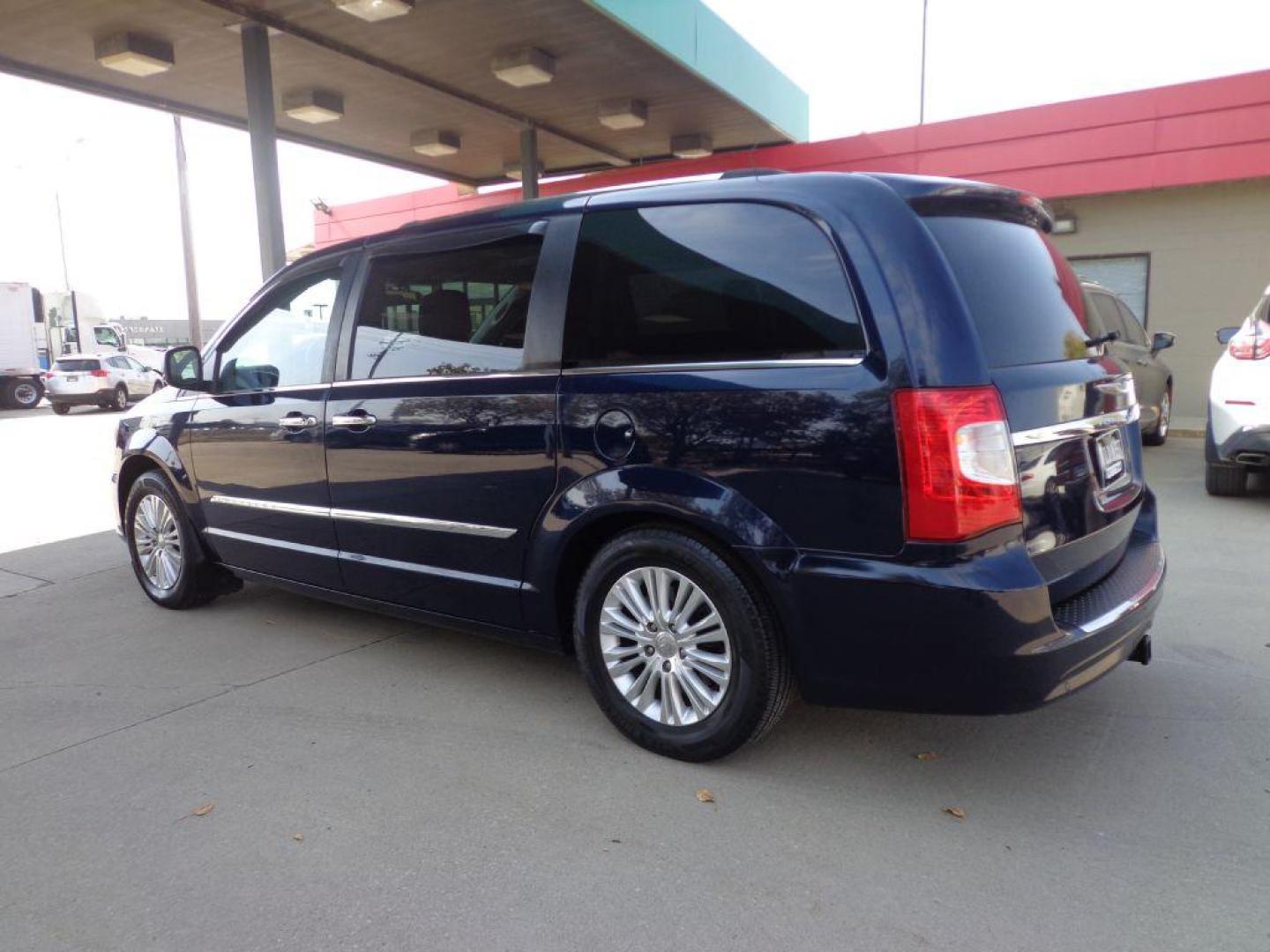 2012 BLUE CHRYSLER TOWN and COUNTRY LIMITED (2C4RC1GG2CR) with an 3.6L engine, Automatic transmission, located at 6610 L St., Omaha, NE, 68117, (402) 731-7800, 41.212872, -96.014702 - 2-OWNER, CLEAN CARFAX, LOW MILEAGE, LOADED WITH REAR ENTERTAINMENT, NAV, BACKUP CAM AND NEWER TIRES! *****We have found that most customers do the majority of their shopping online before visiting a dealership. For this reason we feel it necessary to have a competitive price on our used vehic - Photo#5