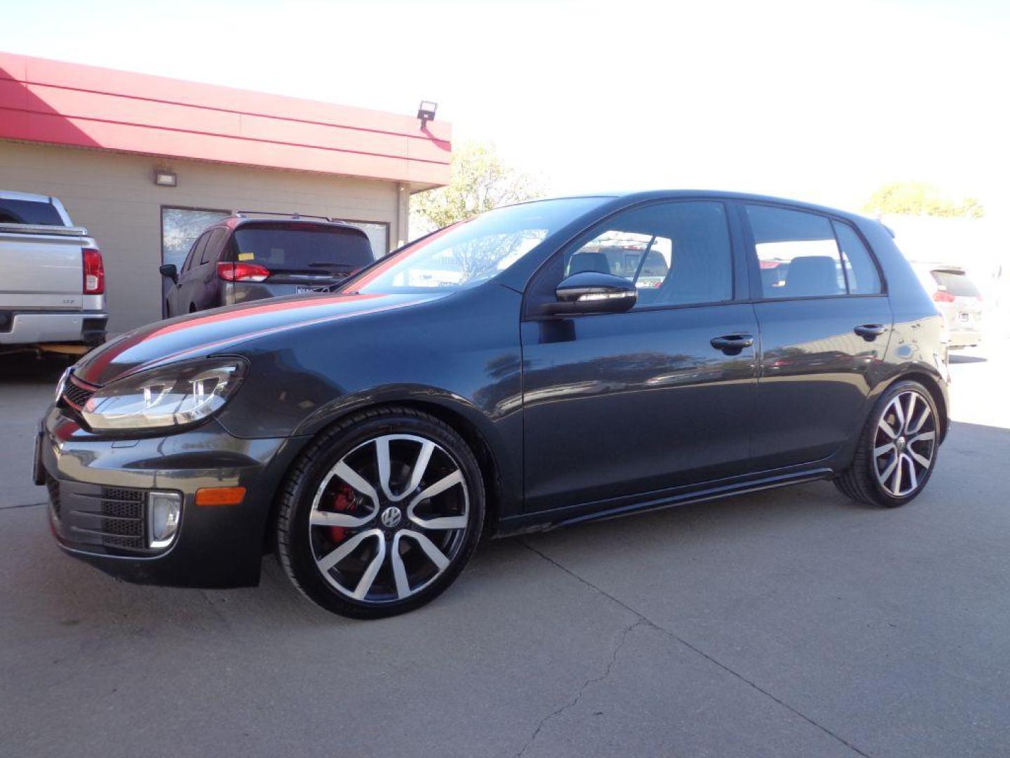 2013 GRAY VOLKSWAGEN GTI (WVWGD7AJ8DW) with an 2.0L engine, Manual transmission, located at 6610 L St., Omaha, NE, 68117, (402) 731-7800, 41.212872, -96.014702 - SHARP GTI WITH A CLEAN CARFAX, LOW MILEAGE, HEATED LEATHER, NAV, SUNROOF, PREMIUM AUDIO AND NEWE TIRES! *****We have found that most customers do the majority of their shopping online before visiting a dealership. For this reason we feel it necessary to have a competitive price on our used ve - Photo#0