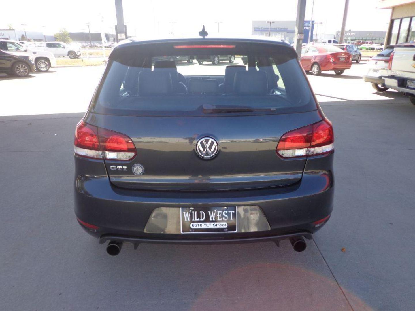 2013 GRAY VOLKSWAGEN GTI (WVWGD7AJ8DW) with an 2.0L engine, Manual transmission, located at 6610 L St., Omaha, NE, 68117, (402) 731-7800, 41.212872, -96.014702 - SHARP GTI WITH A CLEAN CARFAX, LOW MILEAGE, HEATED LEATHER, NAV, SUNROOF, PREMIUM AUDIO AND NEWE TIRES! *****We have found that most customers do the majority of their shopping online before visiting a dealership. For this reason we feel it necessary to have a competitive price on our used ve - Photo#4