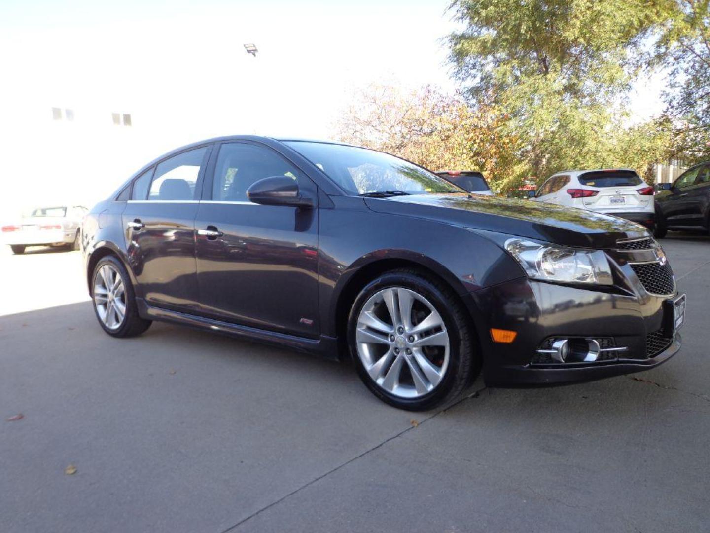 2014 BLACK CHEVROLET CRUZE LTZ (1G1PG5SB5E7) with an 1.4L engine, Automatic transmission, located at 6610 L St., Omaha, NE, 68117, (402) 731-7800, 41.212872, -96.014702 - 2-OWNER, CLEAN CARFAX WITH A SUNROOF, BACKUP CAM AND NEWER TIRES! *****We have found that most customers do the majority of their shopping online before visiting a dealership. For this reason we feel it necessary to have a competitive price on our used vehicles right up front. We spend time r - Photo#2