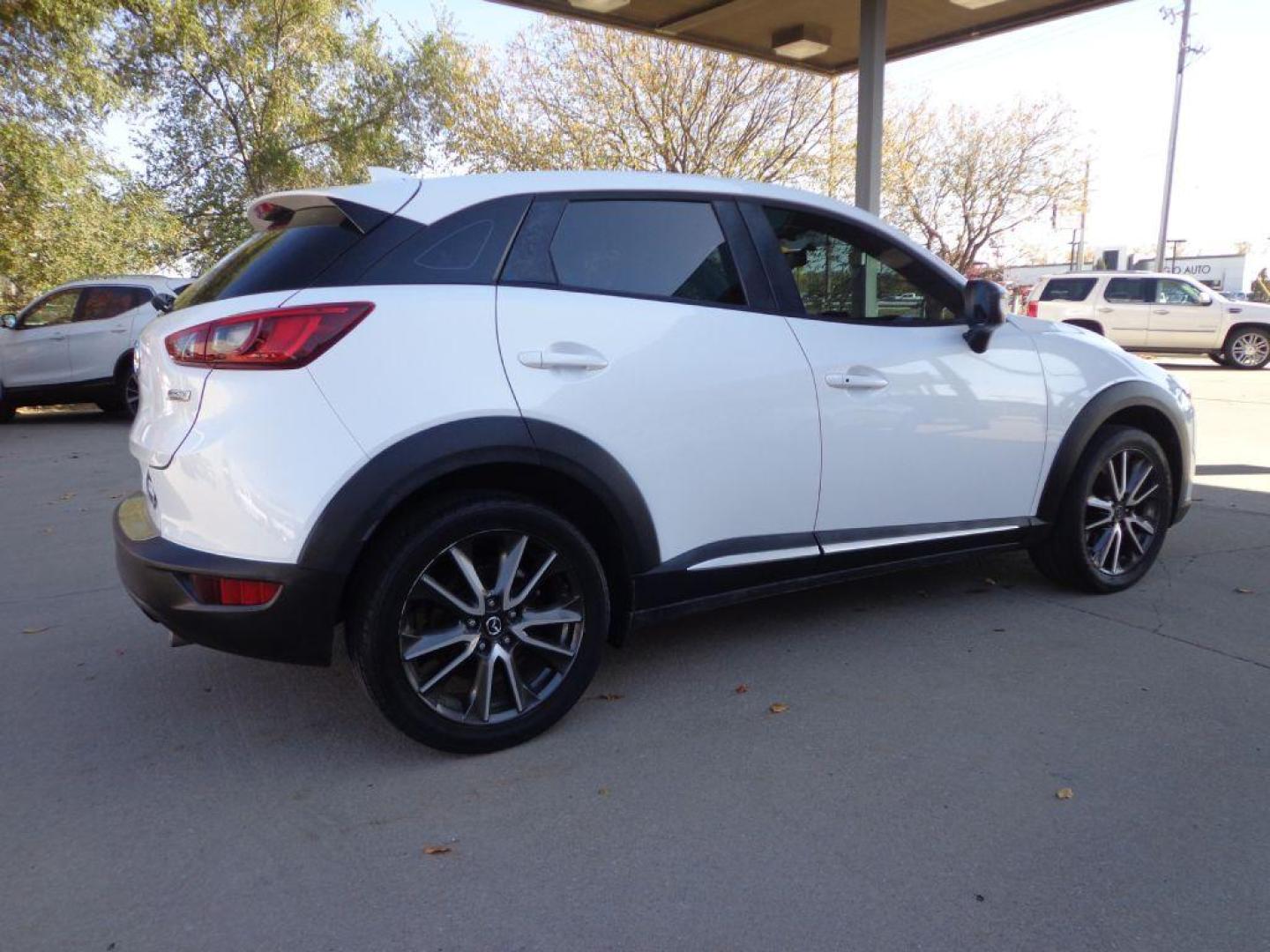 2017 WHITE MAZDA CX-3 GRAND TOURING (JM1DKFD74H0) with an 2.0L engine, Automatic transmission, located at 6610 L St., Omaha, NE, 68117, (402) 731-7800, 41.212872, -96.014702 - SHARP GT MODEL WITH A CLEAN CARFAX, LOW MILEAGE AND LOADED WITH OPTIONS! *****We have found that most customers do the majority of their shopping online before visiting a dealership. For this reason we feel it necessary to have a competitive price on our used vehicles right up front. We spend t - Photo#3