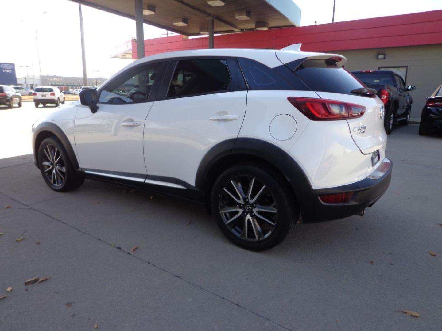 2017 WHITE MAZDA CX-3 GRAND TOURING (JM1DKFD74H0) with an 2.0L engine, Automatic transmission, located at 6610 L St., Omaha, NE, 68117, (402) 731-7800, 41.212872, -96.014702 - SHARP GT MODEL WITH A CLEAN CARFAX, LOW MILEAGE AND LOADED WITH OPTIONS! *****We have found that most customers do the majority of their shopping online before visiting a dealership. For this reason we feel it necessary to have a competitive price on our used vehicles right up front. We spend t - Photo#5