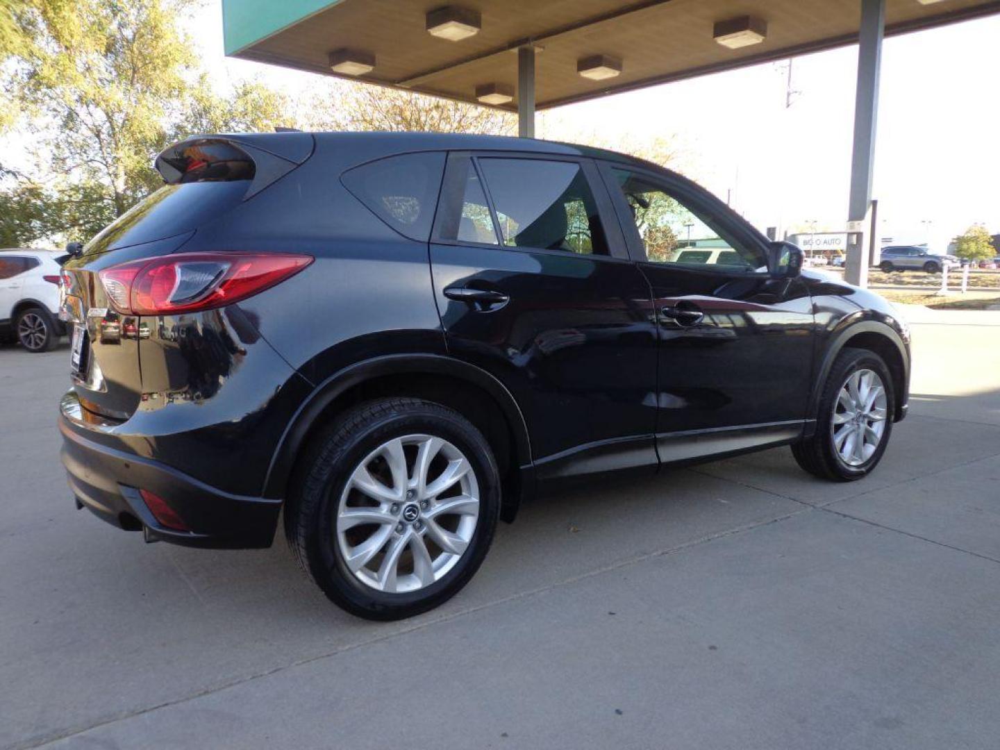 2013 BLACK MAZDA CX-5 GT (JM3KE4DEXD0) with an 2.0L engine, Automatic transmission, located at 6610 L St., Omaha, NE, 68117, (402) 731-7800, 41.212872, -96.014702 - SHARP CX-5 WITH A CLEAN CARFAX, LOADED WITH HEATED LEATHER, SUNROOF, NAV, BACKUP CAM, NEWER TIRES AND MUCH MORE! *****We have found that most customers do the majority of their shopping online before visiting a dealership. For this reason we feel it necessary to have a competitive price on our - Photo#3