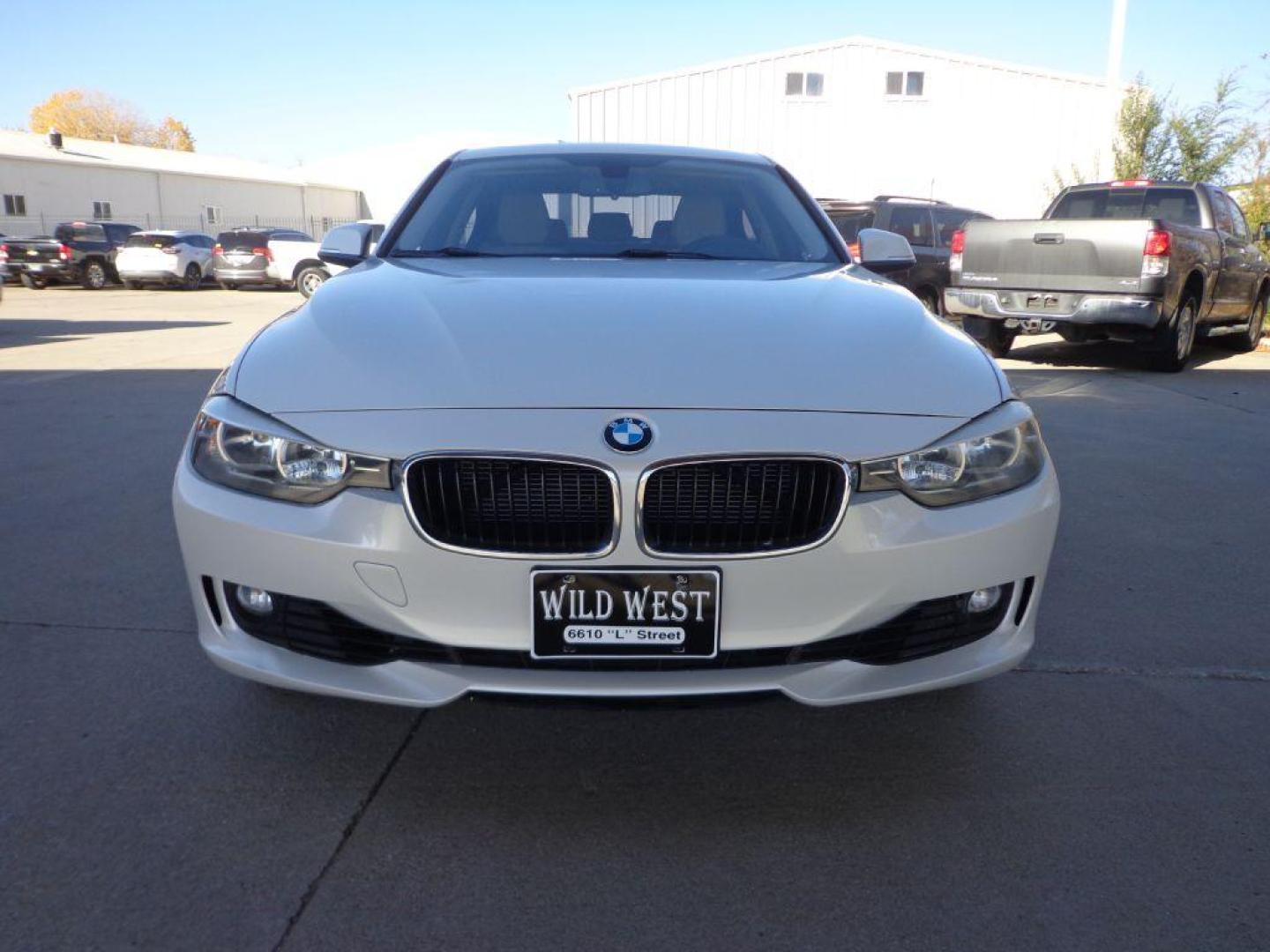 2013 WHITE BMW 328 XI (WBA3B3C53DF) with an 2.0L engine, Automatic transmission, located at 6610 L St., Omaha, NE, 68117, (402) 731-7800, 41.212872, -96.014702 - SHARP XI MODEL WITH LOW MILEAGE AND A CLEAN CARFAX! *****We have found that most customers do the majority of their shopping online before visiting a dealership. For this reason we feel it necessary to have a competitive price on our used vehicles right up front. We spend time researching the r - Photo#1