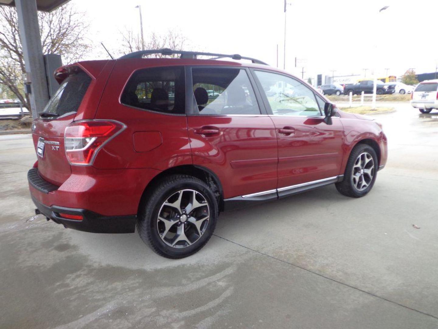 2015 MAROON SUBARU FORESTER 2.0XT TOURING (JF2SJGWC9FH) with an 2.0L engine, Continuously Variable transmission, located at 6610 L St., Omaha, NE, 68117, (402) 731-7800, 41.212872, -96.014702 - 2-OWNER, CLEAN CARFAX, LOW MILEAGE LOADED WITH OPTIONS AND NEWER TIRES! *****We have found that most customers do the majority of their shopping online before visiting a dealership. For this reason we feel it necessary to have a competitive price on our used vehicles right up front. We spend ti - Photo#3