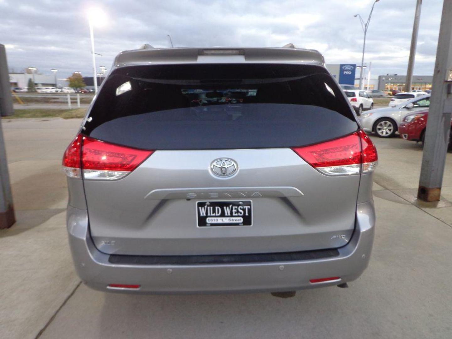 2011 SILVER TOYOTA SIENNA XLE (5TDDK3DC7BS) with an 3.5L engine, Automatic transmission, located at 6610 L St., Omaha, NE, 68117, (402) 731-7800, 41.212872, -96.014702 - 2-OWNER, AWD, CLEAN CARFAX, LOW MILEAGE, SUNROOF, NAV, BACKUP CAM, JBL AUDIO AND NEWER TIRES! *****We have found that most customers do the majority of their shopping online before visiting a dealership. For this reason we feel it necessary to have a competitive price on our used vehicles right - Photo#4