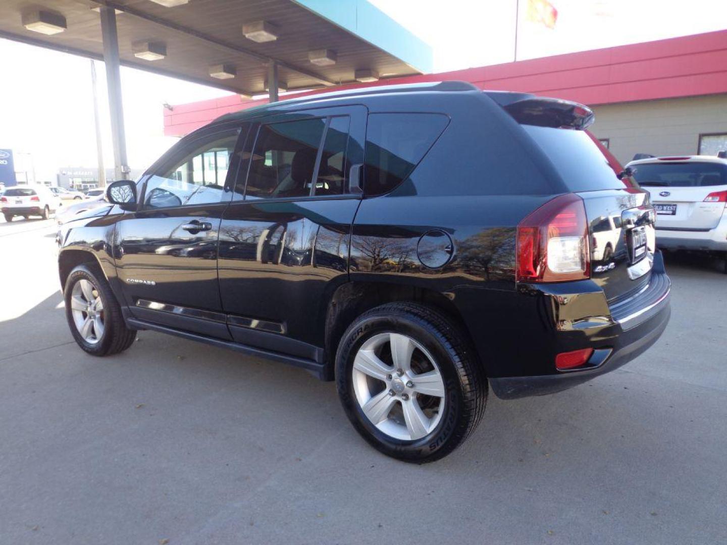 2016 BLACK JEEP COMPASS HIGH ALTITUDE (1C4NJDEB6GD) with an 2.4L engine, Automatic transmission, located at 6610 L St., Omaha, NE, 68117, (402) 731-7800, 41.212872, -96.014702 - Photo#5