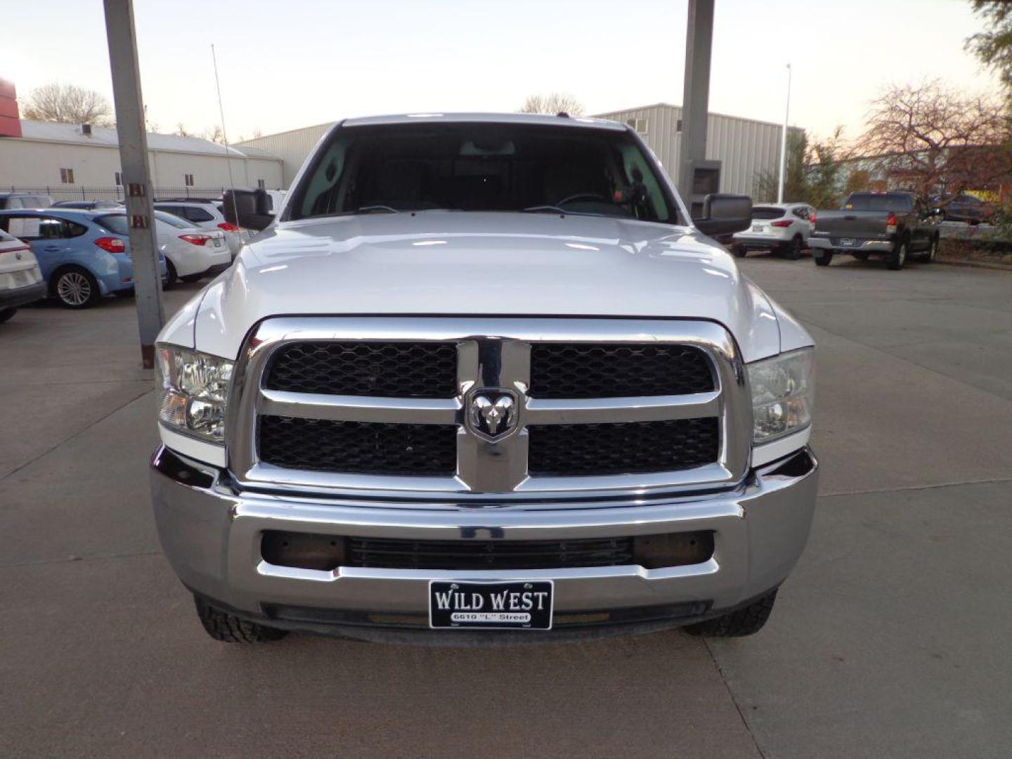 2015 WHITE RAM 2500 SLT (3C6TR5DT4FG) with an 5.7L engine, Automatic transmission, located at 6610 L St., Omaha, NE, 68117, (402) 731-7800, 41.212872, -96.014702 - SHARP SOUTHERN RAM WITH A CLEAN CARFAX, LOW MILEAGE, POWER RUNNING BOARDS AND NEWER TIRES! *****We have found that most customers do the majority of their shopping online before visiting a dealership. For this reason we feel it necessary to have a competitive price on our used vehicles right up - Photo#1