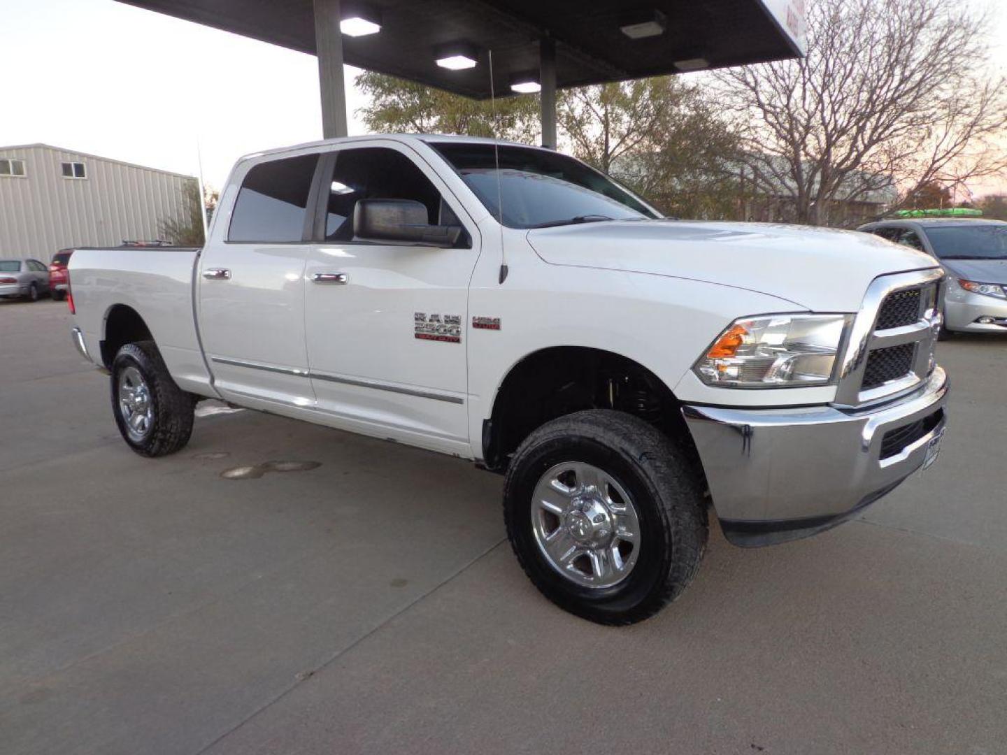 2015 WHITE RAM 2500 SLT (3C6TR5DT4FG) with an 5.7L engine, Automatic transmission, located at 6610 L St., Omaha, NE, 68117, (402) 731-7800, 41.212872, -96.014702 - SHARP SOUTHERN RAM WITH A CLEAN CARFAX, LOW MILEAGE, POWER RUNNING BOARDS AND NEWER TIRES! *****We have found that most customers do the majority of their shopping online before visiting a dealership. For this reason we feel it necessary to have a competitive price on our used vehicles right up - Photo#2