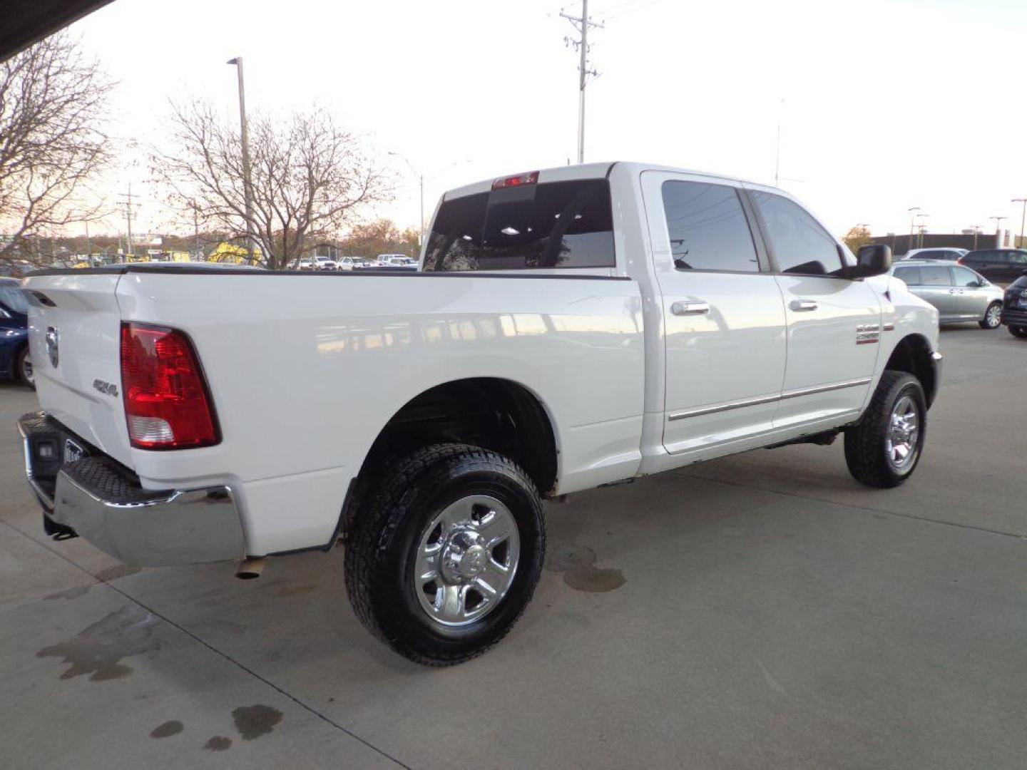 2015 WHITE RAM 2500 SLT (3C6TR5DT4FG) with an 5.7L engine, Automatic transmission, located at 6610 L St., Omaha, NE, 68117, (402) 731-7800, 41.212872, -96.014702 - SHARP SOUTHERN RAM WITH A CLEAN CARFAX, LOW MILEAGE, POWER RUNNING BOARDS AND NEWER TIRES! *****We have found that most customers do the majority of their shopping online before visiting a dealership. For this reason we feel it necessary to have a competitive price on our used vehicles right up - Photo#3