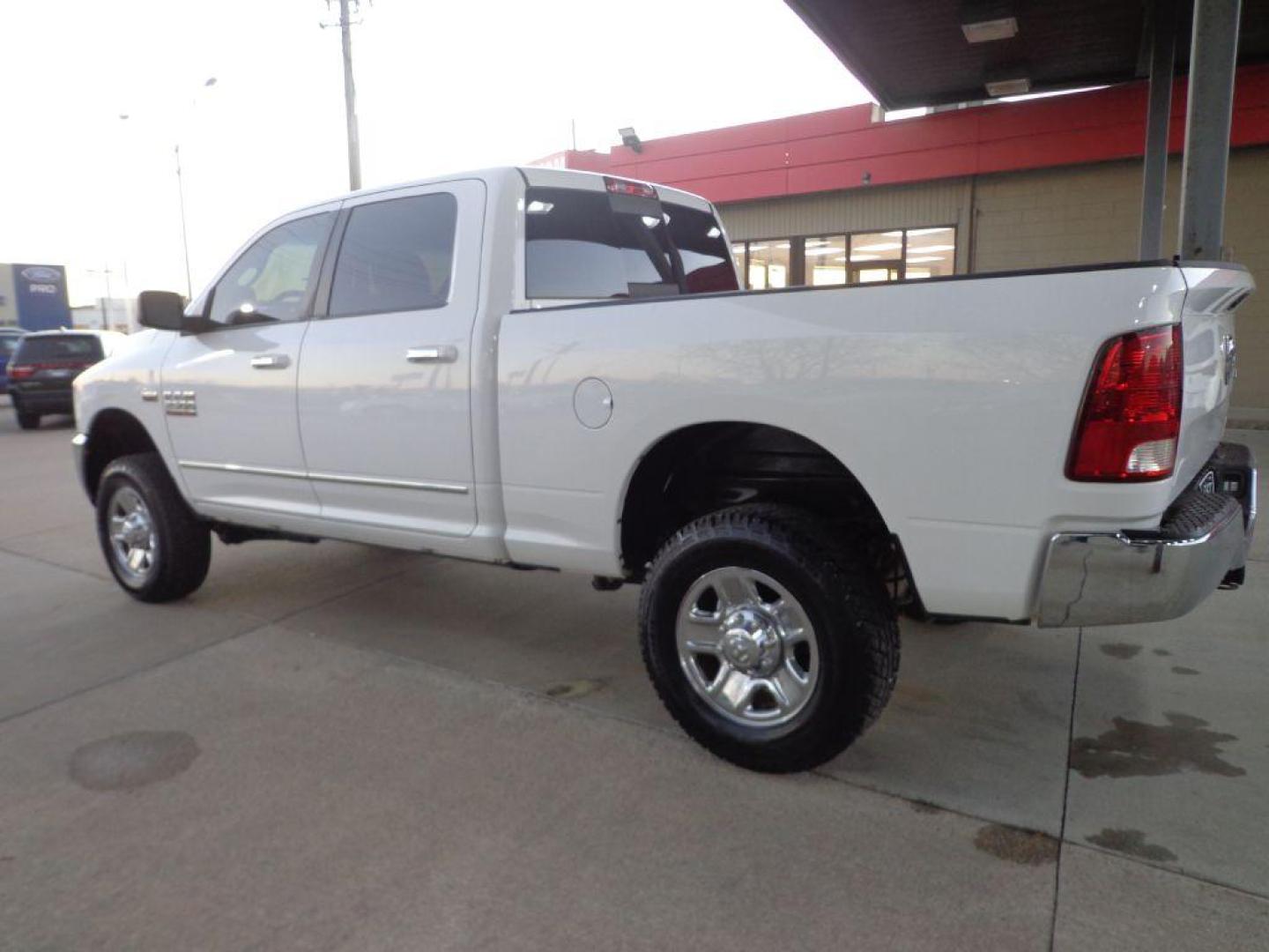 2015 WHITE RAM 2500 SLT (3C6TR5DT4FG) with an 5.7L engine, Automatic transmission, located at 6610 L St., Omaha, NE, 68117, (402) 731-7800, 41.212872, -96.014702 - SHARP SOUTHERN RAM WITH A CLEAN CARFAX, LOW MILEAGE, POWER RUNNING BOARDS AND NEWER TIRES! *****We have found that most customers do the majority of their shopping online before visiting a dealership. For this reason we feel it necessary to have a competitive price on our used vehicles right up - Photo#5