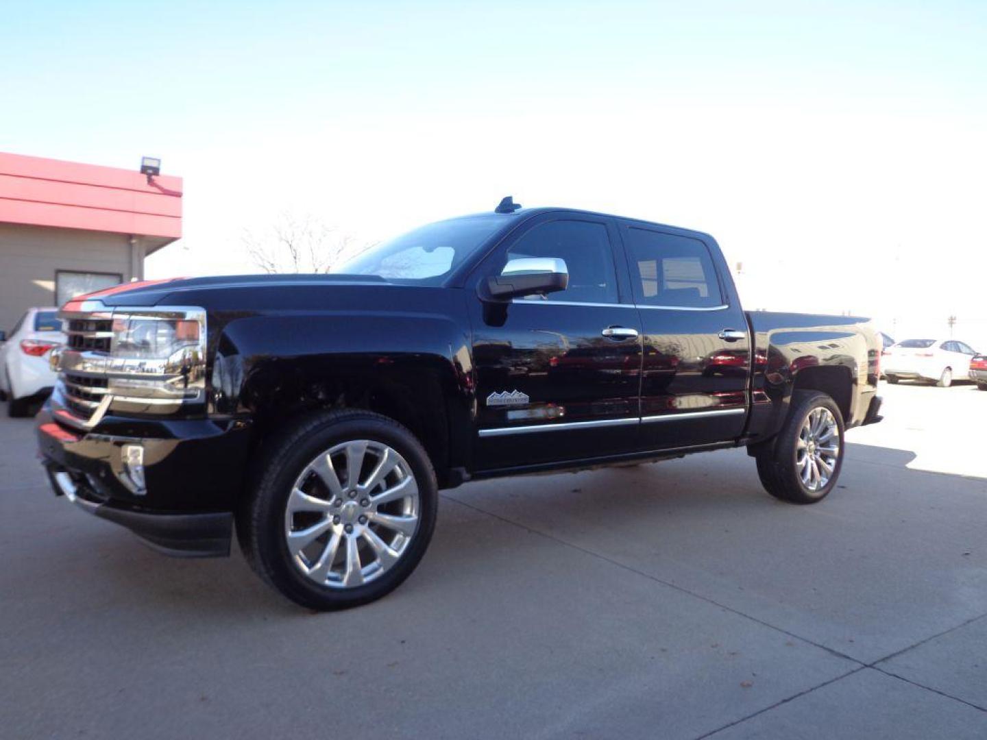 2016 BLACK CHEVROLET SILVERADO 1500 HIGH COUNTRY (3GCUKTEC6GG) with an 5.3L engine, Automatic transmission, located at 6610 L St., Omaha, NE, 68117, (402) 731-7800, 41.212872, -96.014702 - 2-OWNER, CLEAN CARFAX, LOW MILEAGE, LOADED WITH A SUNROOF, NAV, DRIVERS ASSIST AND NEWER TIRES! *****We have found that most customers do the majority of their shopping online before visiting a dealership. For this reason we feel it necessary to have a competitive price on our used vehicles rig - Photo#0