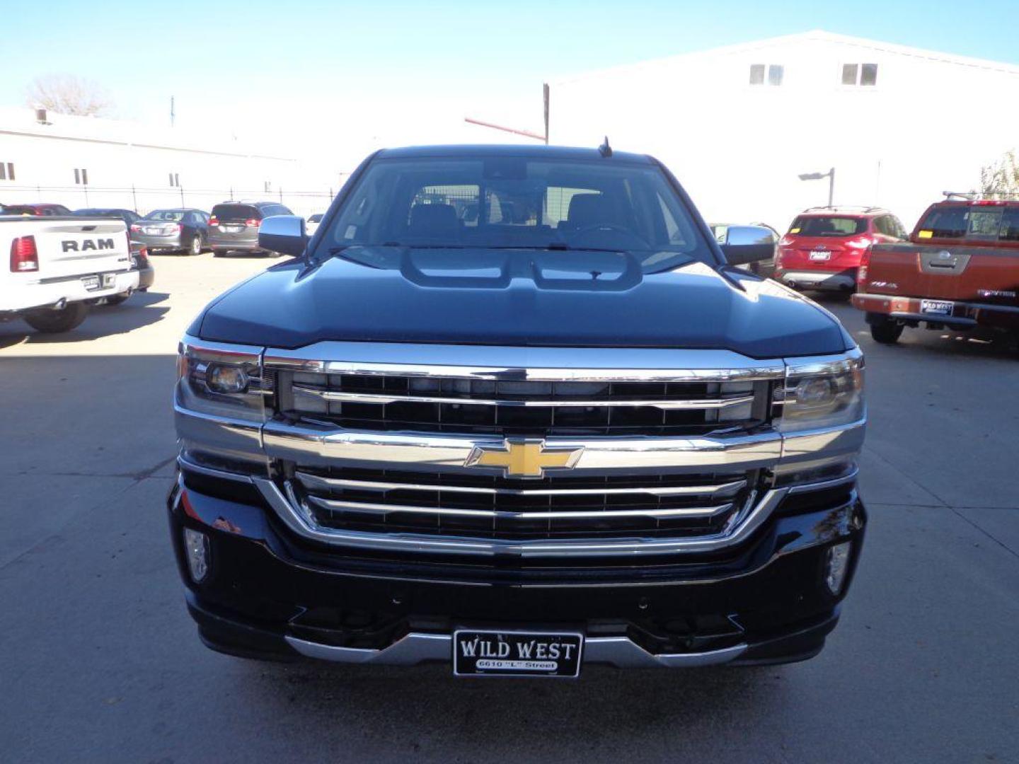 2016 BLACK CHEVROLET SILVERADO 1500 HIGH COUNTRY (3GCUKTEC6GG) with an 5.3L engine, Automatic transmission, located at 6610 L St., Omaha, NE, 68117, (402) 731-7800, 41.212872, -96.014702 - 2-OWNER, CLEAN CARFAX, LOW MILEAGE, LOADED WITH A SUNROOF, NAV, DRIVERS ASSIST AND NEWER TIRES! *****We have found that most customers do the majority of their shopping online before visiting a dealership. For this reason we feel it necessary to have a competitive price on our used vehicles rig - Photo#1