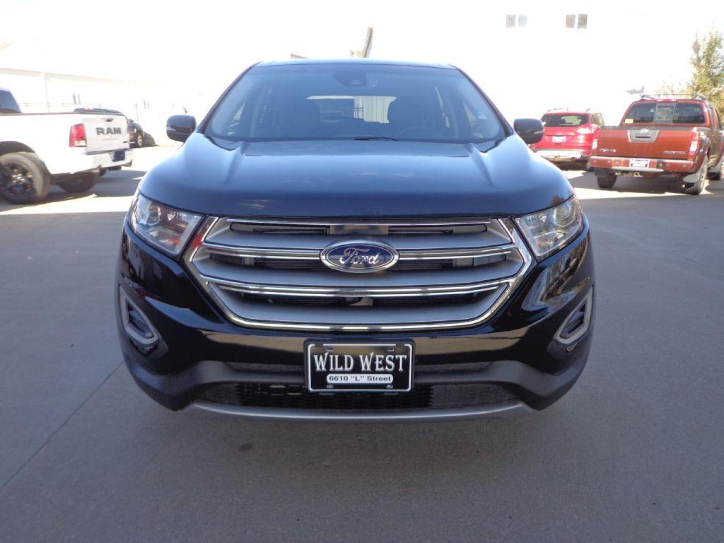 2018 BLACK FORD EDGE SEL (2FMPK4J9XJB) with an 2.0L engine, Automatic transmission, located at 6610 L St., Omaha, NE, 68117, (402) 731-7800, 41.212872, -96.014702 - Photo#1