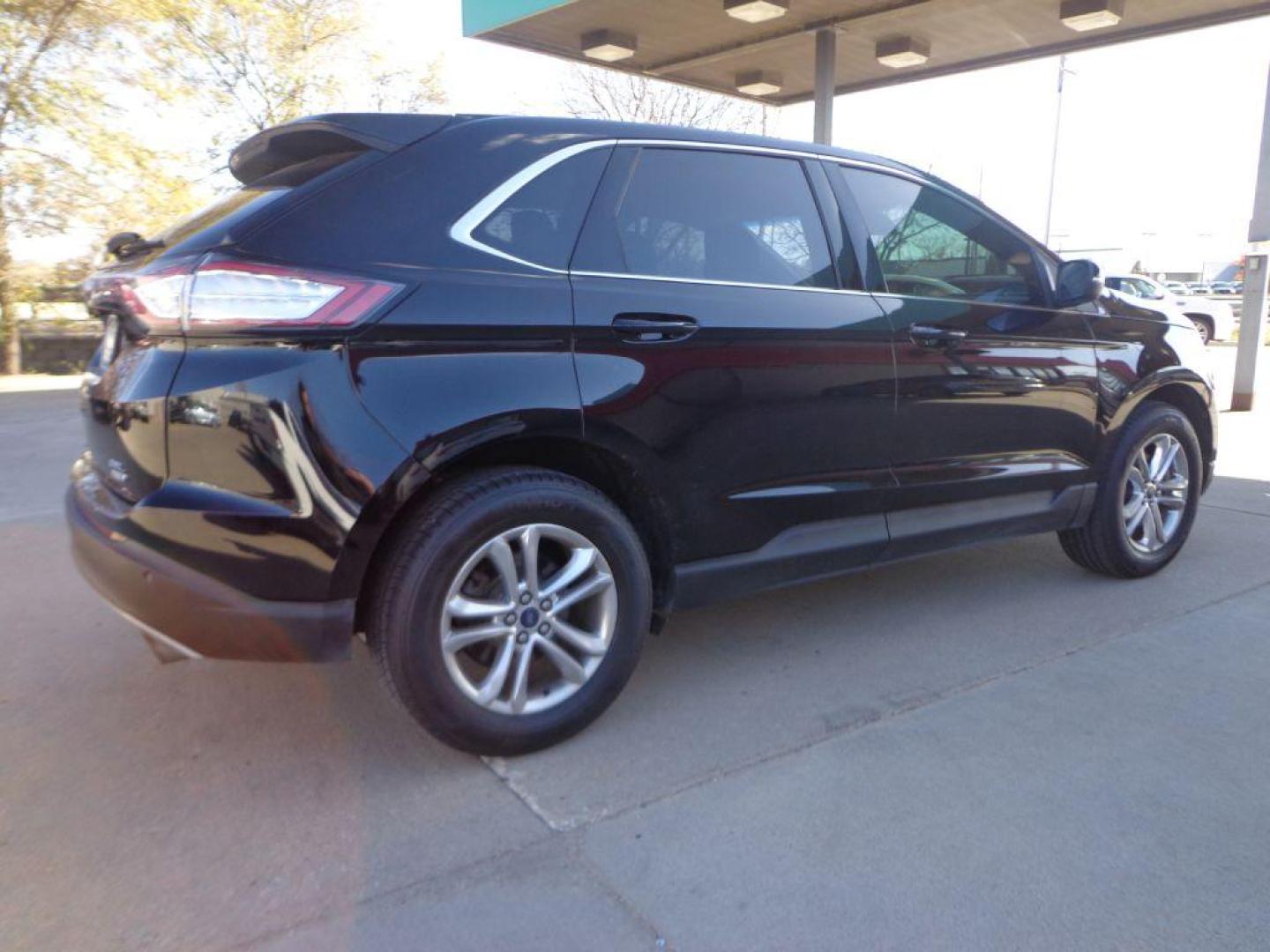 2018 BLACK FORD EDGE SEL (2FMPK4J9XJB) with an 2.0L engine, Automatic transmission, located at 6610 L St., Omaha, NE, 68117, (402) 731-7800, 41.212872, -96.014702 - Photo#3