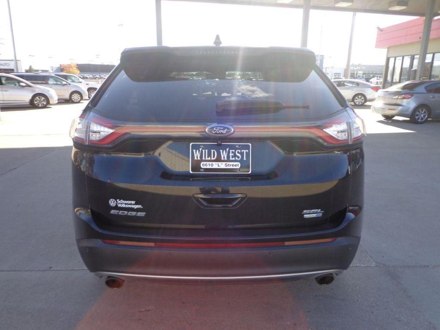 2018 BLACK FORD EDGE SEL (2FMPK4J9XJB) with an 2.0L engine, Automatic transmission, located at 6610 L St., Omaha, NE, 68117, (402) 731-7800, 41.212872, -96.014702 - Photo#4