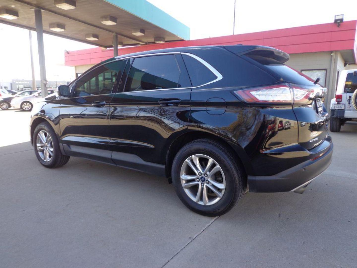 2018 BLACK FORD EDGE SEL (2FMPK4J9XJB) with an 2.0L engine, Automatic transmission, located at 6610 L St., Omaha, NE, 68117, (402) 731-7800, 41.212872, -96.014702 - Photo#5