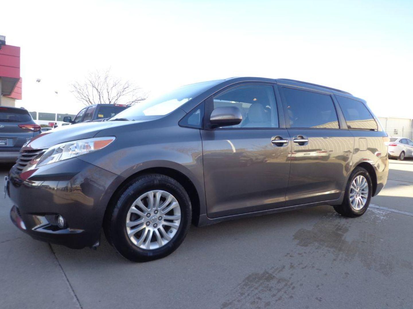 2012 GRAY TOYOTA SIENNA XLE (5TDYK3DC9CS) with an 3.5L engine, Automatic transmission, located at 6610 L St., Omaha, NE, 68117, (402) 731-7800, 41.212872, -96.014702 - 2-OWNER, CLEAN CARFAX, LOW MILEAGE, HEATED LEATHER, SUNROOF, NAV, BACKUP CAM AND NEWER TIRES! *****We have found that most customers do the majority of their shopping online before visiting a dealership. For this reason we feel it necessary to have a competitive price on our used vehicles rig - Photo#0