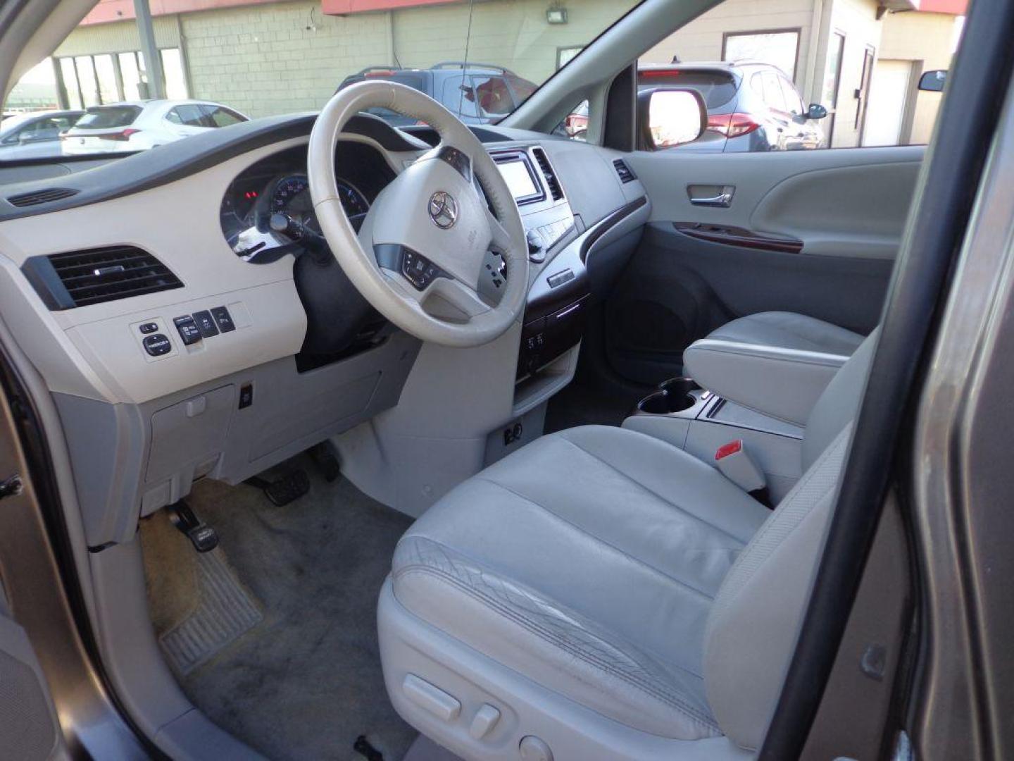 2012 GRAY TOYOTA SIENNA XLE (5TDYK3DC9CS) with an 3.5L engine, Automatic transmission, located at 6610 L St., Omaha, NE, 68117, (402) 731-7800, 41.212872, -96.014702 - 2-OWNER, CLEAN CARFAX, LOW MILEAGE, HEATED LEATHER, SUNROOF, NAV, BACKUP CAM AND NEWER TIRES! *****We have found that most customers do the majority of their shopping online before visiting a dealership. For this reason we feel it necessary to have a competitive price on our used vehicles rig - Photo#10