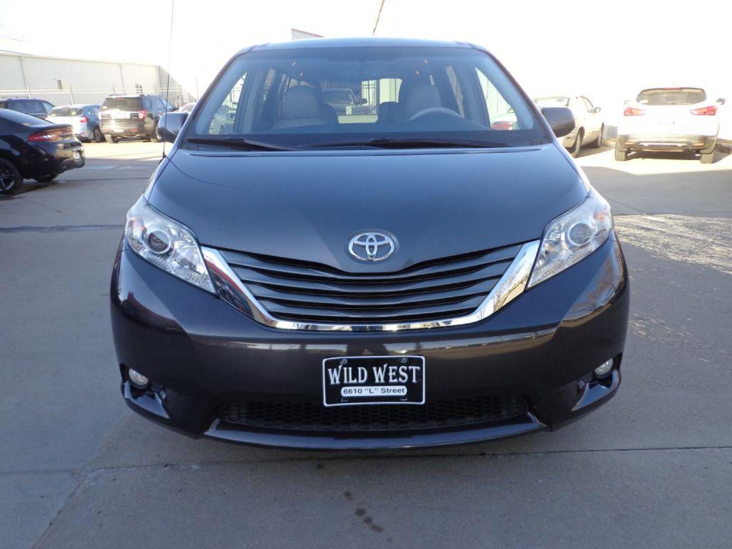 2012 GRAY TOYOTA SIENNA XLE (5TDYK3DC9CS) with an 3.5L engine, Automatic transmission, located at 6610 L St., Omaha, NE, 68117, (402) 731-7800, 41.212872, -96.014702 - 2-OWNER, CLEAN CARFAX, LOW MILEAGE, HEATED LEATHER, SUNROOF, NAV, BACKUP CAM AND NEWER TIRES! *****We have found that most customers do the majority of their shopping online before visiting a dealership. For this reason we feel it necessary to have a competitive price on our used vehicles rig - Photo#1