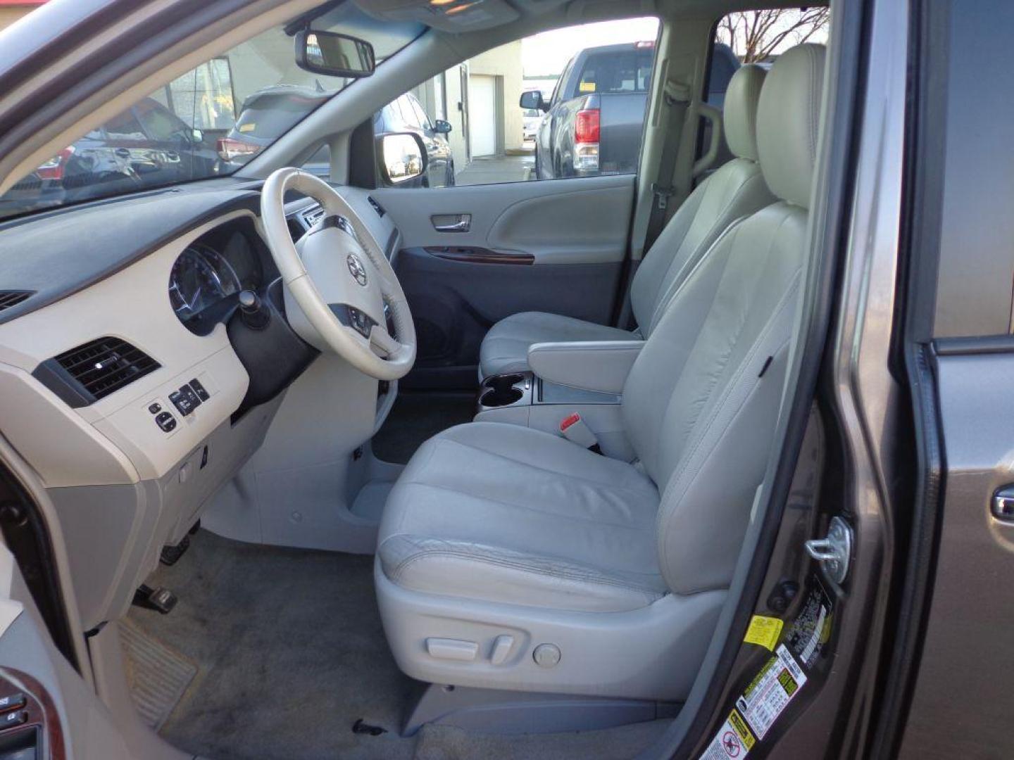 2012 GRAY TOYOTA SIENNA XLE (5TDYK3DC9CS) with an 3.5L engine, Automatic transmission, located at 6610 L St., Omaha, NE, 68117, (402) 731-7800, 41.212872, -96.014702 - 2-OWNER, CLEAN CARFAX, LOW MILEAGE, HEATED LEATHER, SUNROOF, NAV, BACKUP CAM AND NEWER TIRES! *****We have found that most customers do the majority of their shopping online before visiting a dealership. For this reason we feel it necessary to have a competitive price on our used vehicles rig - Photo#8