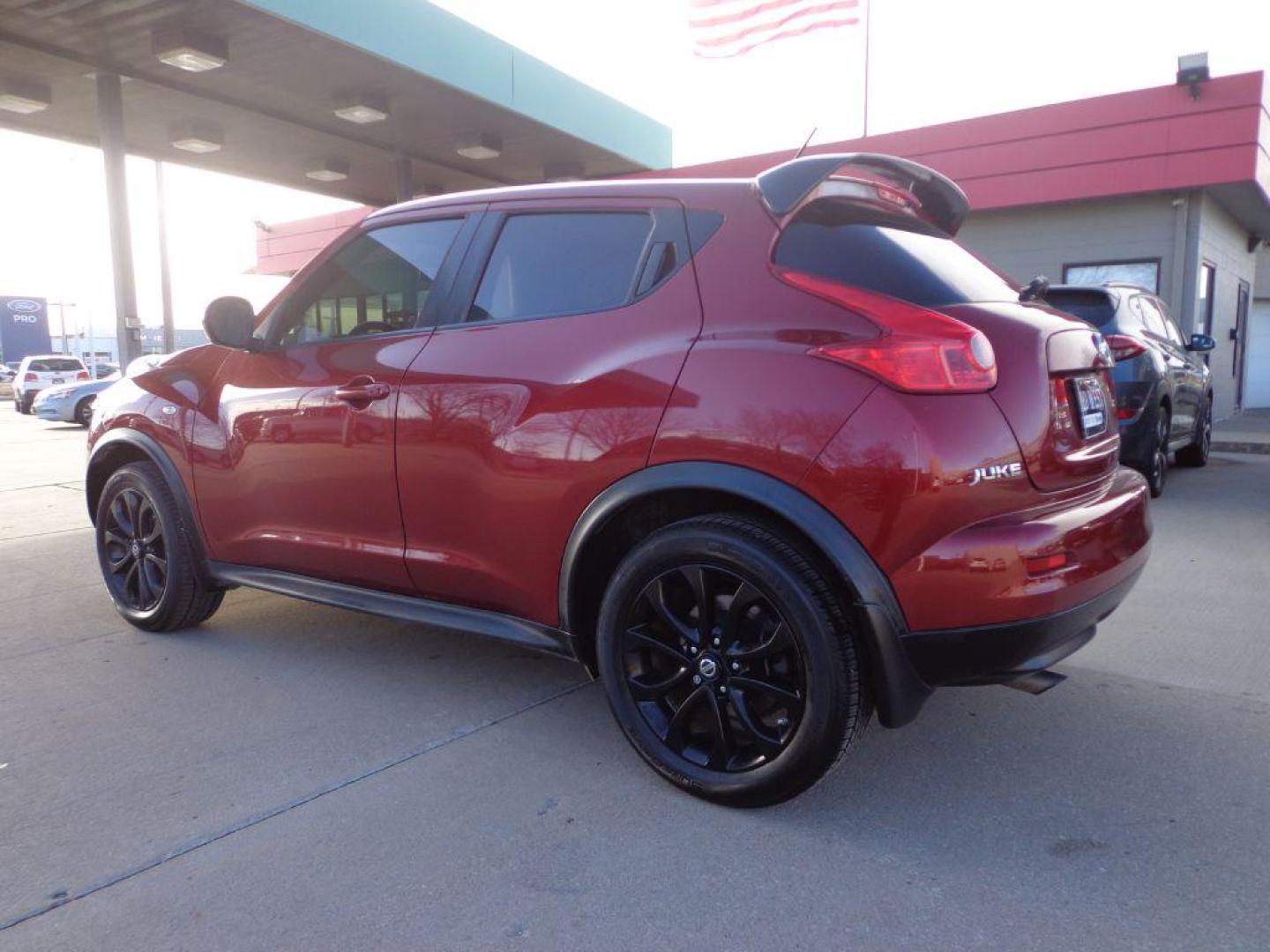 2013 RED NISSAN JUKE SL (JN8AF5MV4DT) with an 1.6L engine, Continuously Variable transmission, located at 6610 L St., Omaha, NE, 68117, (402) 731-7800, 41.212872, -96.014702 - 2-OWNER, CLEAN CARFAX, LOW MILEAGE LOADED WITH HEATED LEATHER, SUNROOF, NAV, BACKUP CAM AND NEWER TIRES! *****We have found that most customers do the majority of their shopping online before visiting a dealership. For this reason we feel it necessary to have a competitive price on our used v - Photo#5