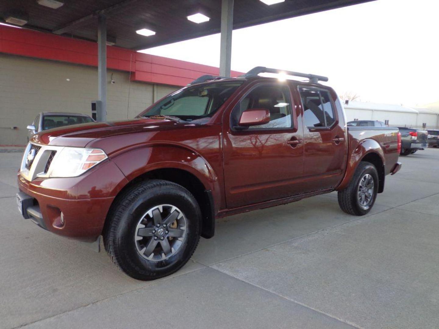 2016 BRONZE NISSAN FRONTIER PRO-4X (1N6AD0EV6GN) with an 4.0L engine, Automatic transmission, located at 6610 L St., Omaha, NE, 68117, (402) 731-7800, 41.212872, -96.014702 - 2-OWNER, CLEAN CARFAX, LOW MILEAGE LOADED WITH HEATED LEATHER, SUNROOF, NAV, BACKUP CAM AND NEWER TIRES! *****We have found that most customers do the majority of their shopping online before visiting a dealership. For this reason we feel it necessary to have a competitive price on our used veh - Photo#0