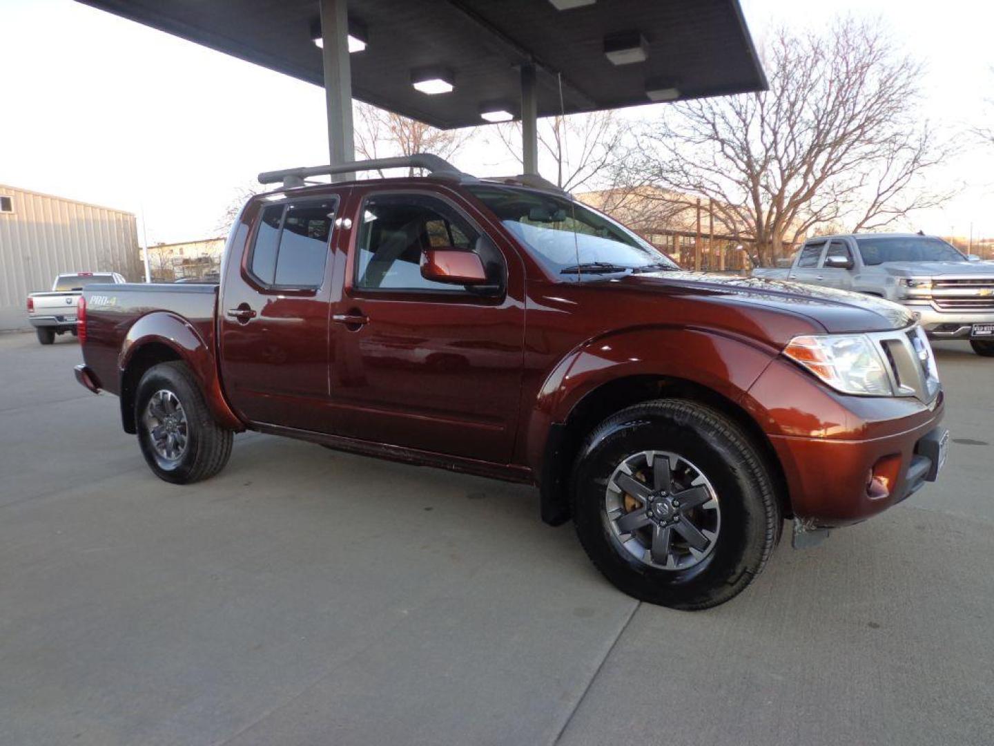 2016 BRONZE NISSAN FRONTIER PRO-4X (1N6AD0EV6GN) with an 4.0L engine, Automatic transmission, located at 6610 L St., Omaha, NE, 68117, (402) 731-7800, 41.212872, -96.014702 - 2-OWNER, CLEAN CARFAX, LOW MILEAGE LOADED WITH HEATED LEATHER, SUNROOF, NAV, BACKUP CAM AND NEWER TIRES! *****We have found that most customers do the majority of their shopping online before visiting a dealership. For this reason we feel it necessary to have a competitive price on our used veh - Photo#2