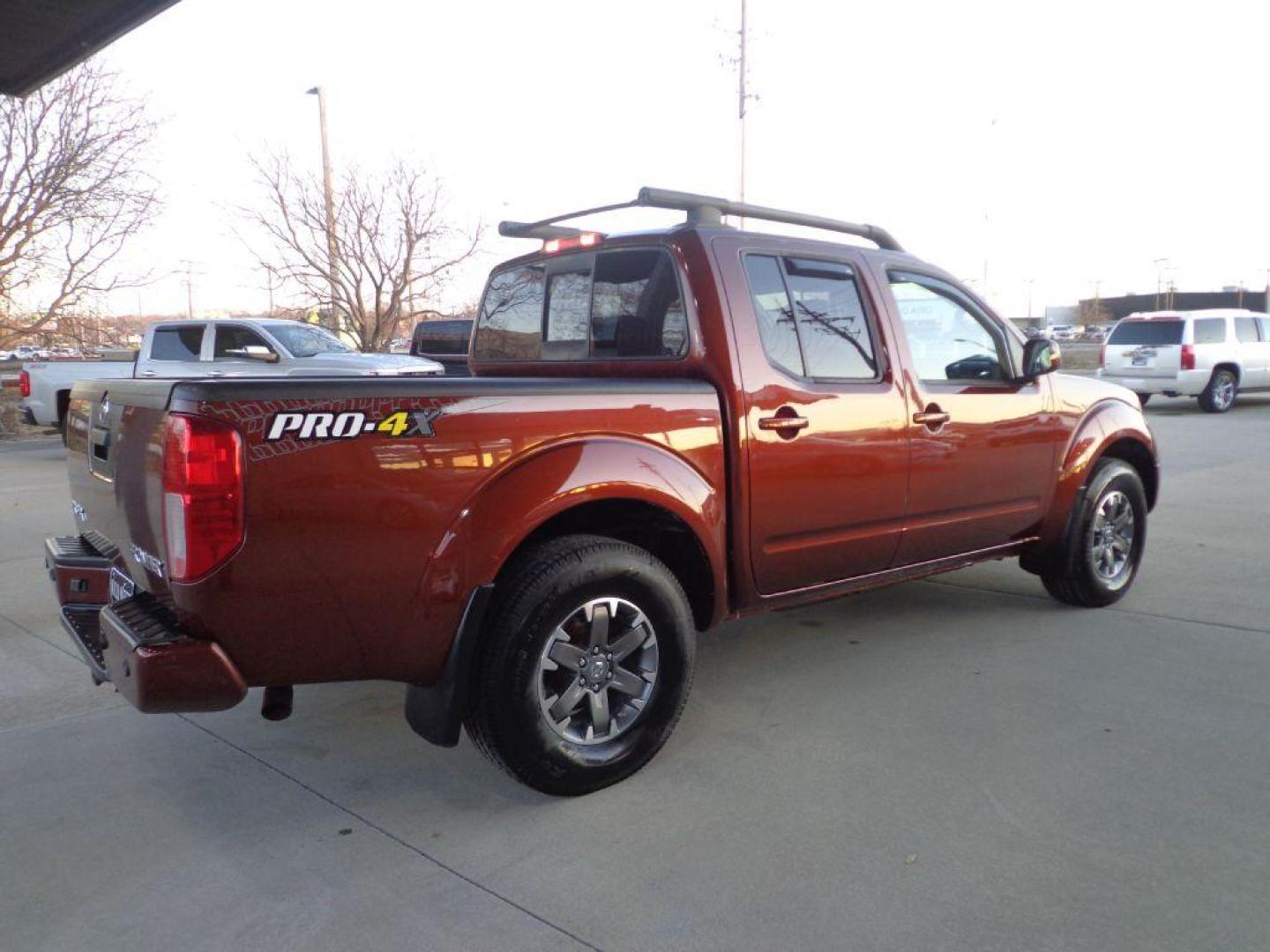 2016 BRONZE NISSAN FRONTIER PRO-4X (1N6AD0EV6GN) with an 4.0L engine, Automatic transmission, located at 6610 L St., Omaha, NE, 68117, (402) 731-7800, 41.212872, -96.014702 - 2-OWNER, CLEAN CARFAX, LOW MILEAGE LOADED WITH HEATED LEATHER, SUNROOF, NAV, BACKUP CAM AND NEWER TIRES! *****We have found that most customers do the majority of their shopping online before visiting a dealership. For this reason we feel it necessary to have a competitive price on our used veh - Photo#3