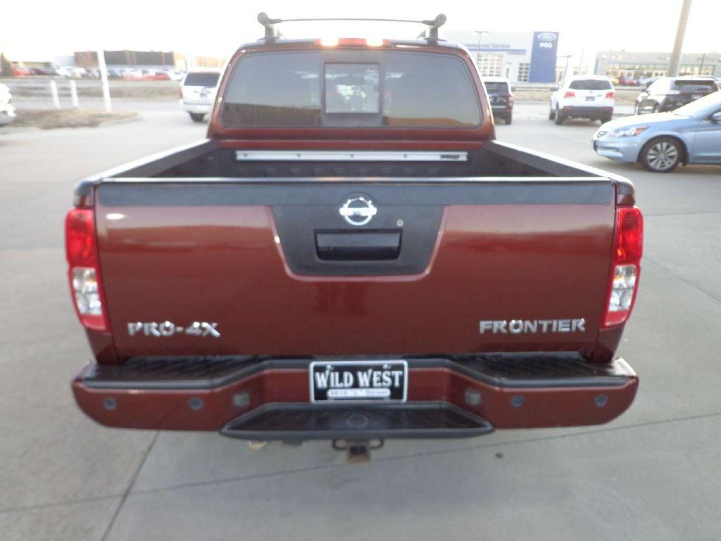 2016 BRONZE NISSAN FRONTIER PRO-4X (1N6AD0EV6GN) with an 4.0L engine, Automatic transmission, located at 6610 L St., Omaha, NE, 68117, (402) 731-7800, 41.212872, -96.014702 - 2-OWNER, CLEAN CARFAX, LOW MILEAGE LOADED WITH HEATED LEATHER, SUNROOF, NAV, BACKUP CAM AND NEWER TIRES! *****We have found that most customers do the majority of their shopping online before visiting a dealership. For this reason we feel it necessary to have a competitive price on our used veh - Photo#4