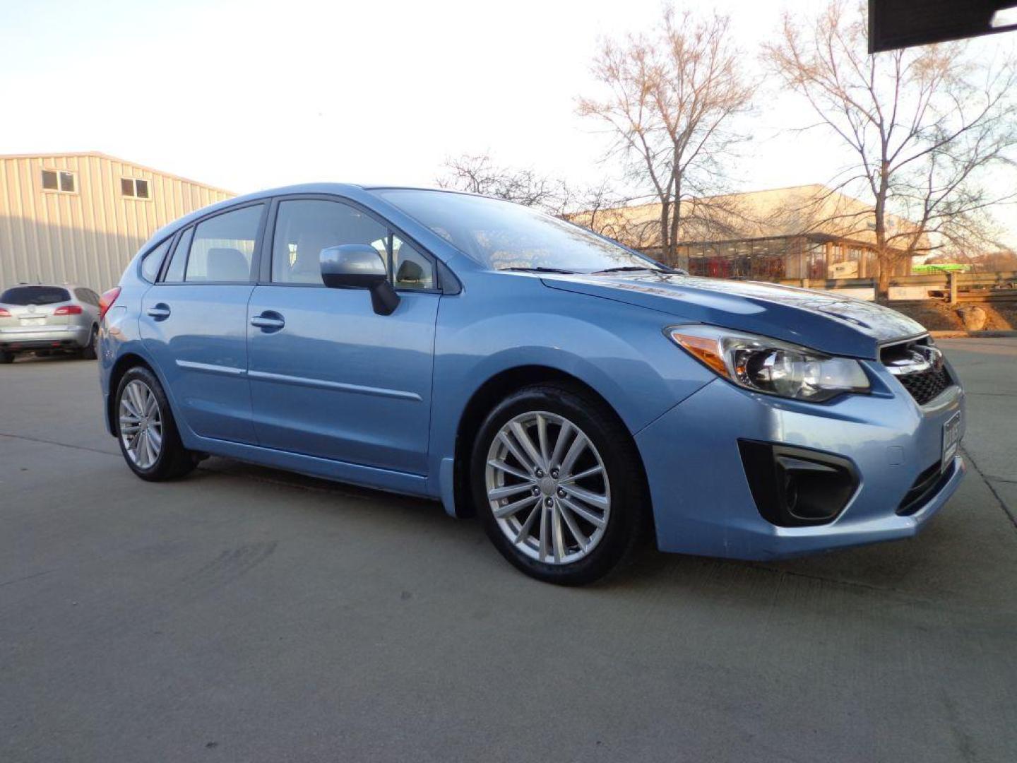 2012 BLUE SUBARU IMPREZA PREMIUM (JF1GPAD63CH) with an 2.0L engine, Continuously Variable transmission, located at 6610 L St., Omaha, NE, 68117, (402) 731-7800, 41.212872, -96.014702 - 2-OWNER, CLEAN CARFAX, LOW MILEAGE, SUNROOF, HEATED TIRES AND NEWER TIRES! *****We have found that most customers do the majority of their shopping online before visiting a dealership. For this reason we feel it necessary to have a competitive price on our used vehicles right up front. We sp - Photo#2